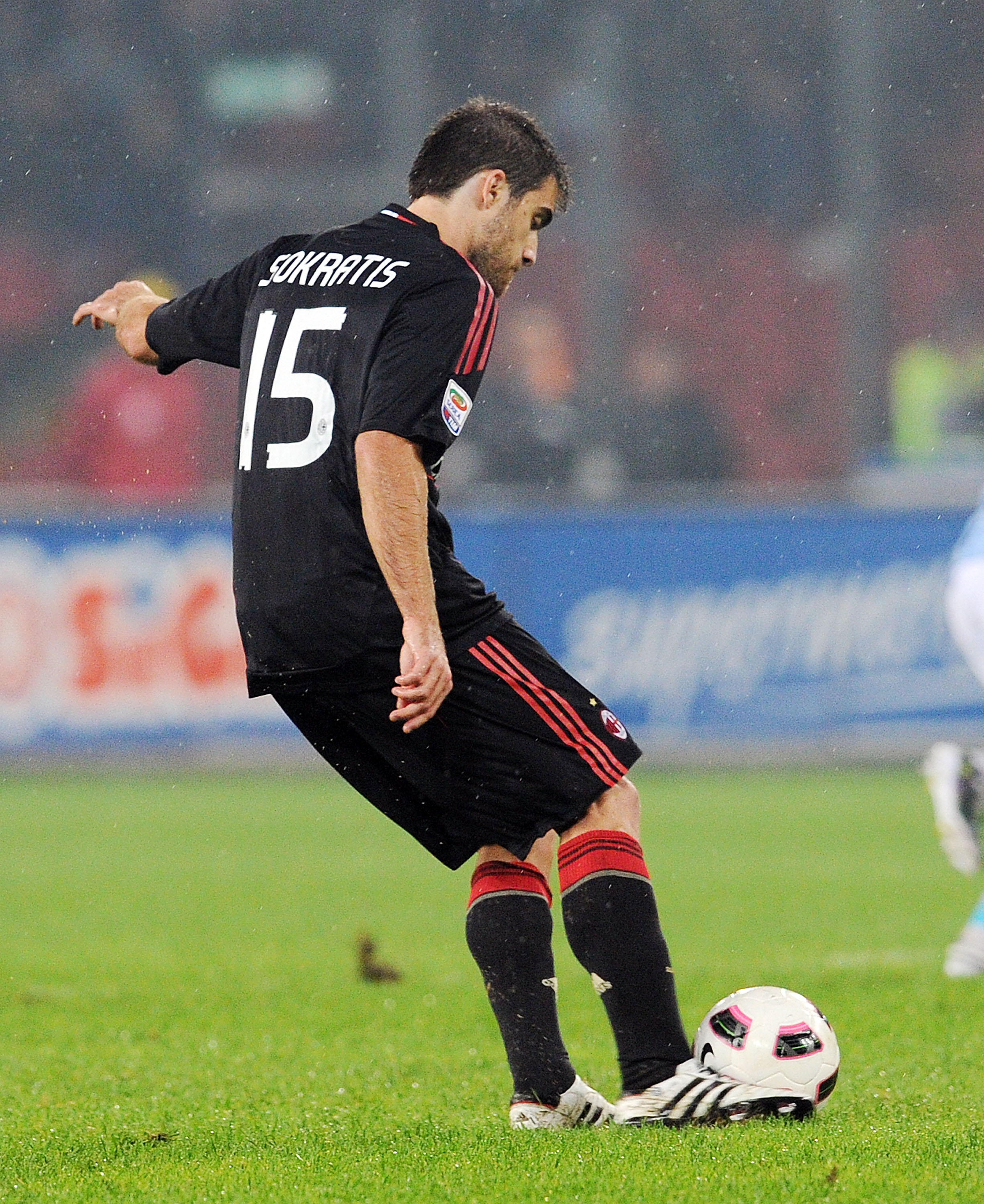 NAPLES, ITALY - OCTOBER 25:  Sokratis Papastathopoulos of AC Milan in action during the Serie A match between SSC Napoli and AC Milan at Stadio San Paolo on October 25, 2010 in Naples, Italy.  (Photo by Giuseppe Bellini/Getty Images)