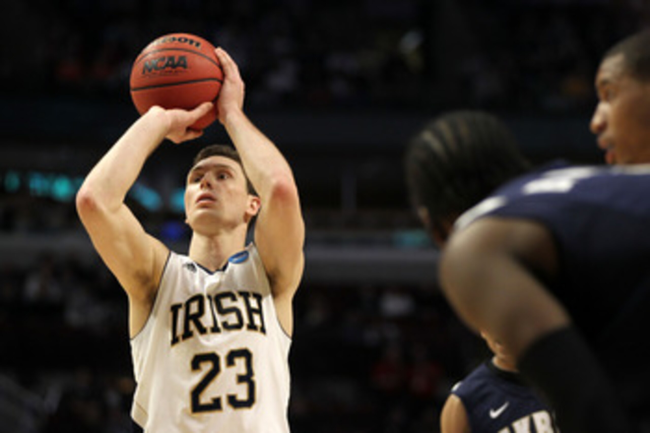 CHICAGO, IL - MARCH 18: Ben Hansbrough #23 of the Notre Dame Fighting Irish shoots a foul shot as the Akron Zips look on in the first half during the second round of the 2011 NCAA men's basketball tournament at the United Center on March 18, 2011 in Chica