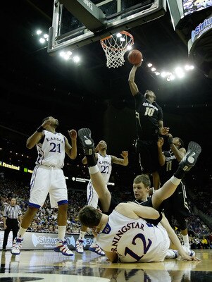NEWARK, NJ - MARCH 25:  Brandon Knight #12 of the Kentucky Wildcats shoots the winning shot to defeat the Ohio State Buckeyes in the east regional semifinal of the 2011 NCAA Men's Basketball Tournament at the Prudential Center on March 25, 2011 in Newark,