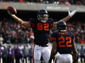 CHICAGO - NOVEMBER 14: Greg Olsen #82 of the Chicago Bears celebrates a touchdown catch with teammate Matt Forte #22 against the Minnesota Vikings at Soldier Field on November 14, 2010 in Chicago, Illinois. (Photo by Jonathan Daniel/Getty Images)