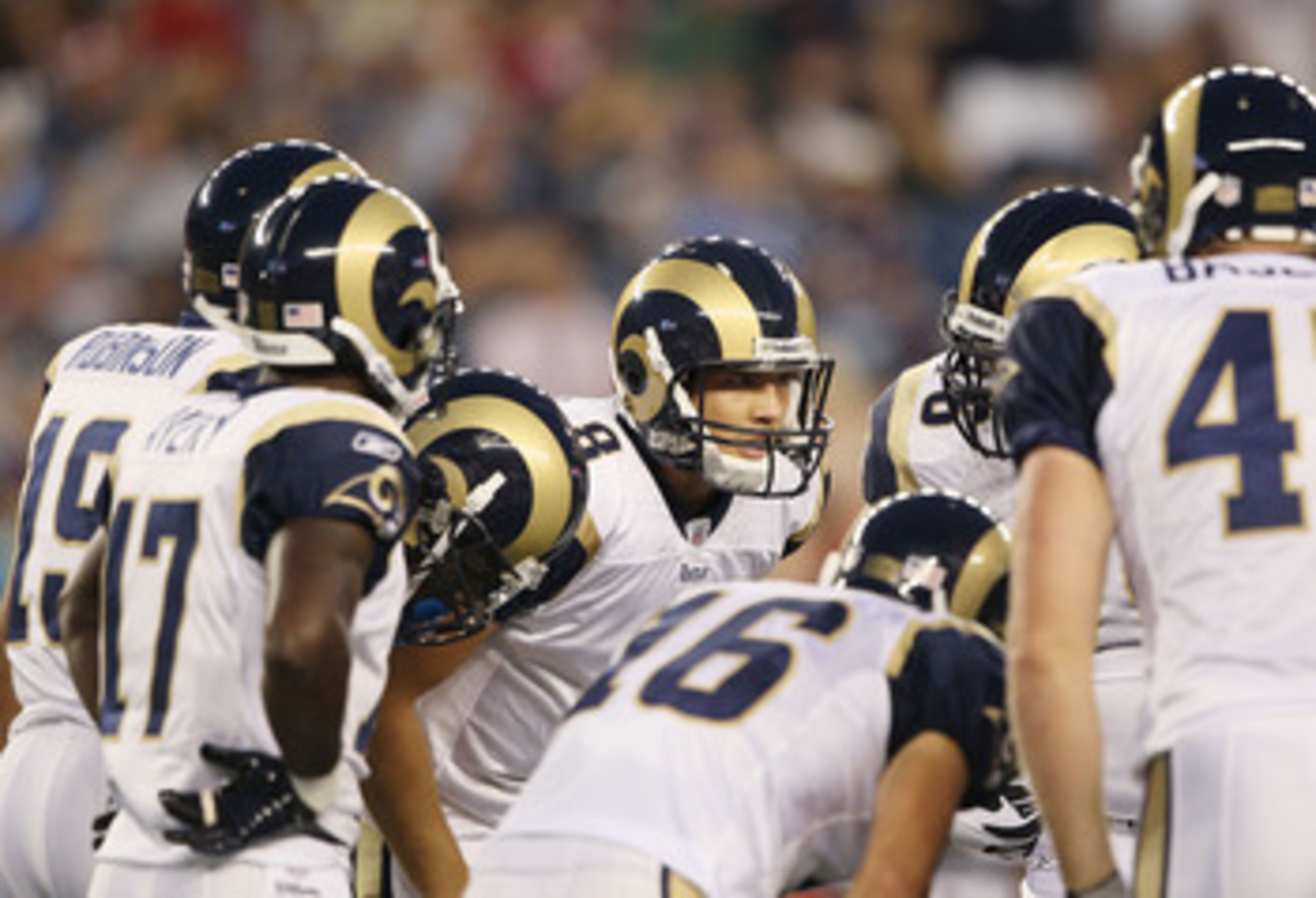 FOXBORO, MA - AUGUST 26:  Sam Bradford #8 of the St. Louis Rams talks in the huddle in the first half against the New England Patriots on August 26, 2010 at Gillette Stadium in Foxboro, Massachusetts.  (Photo by Elsa/Getty Images)