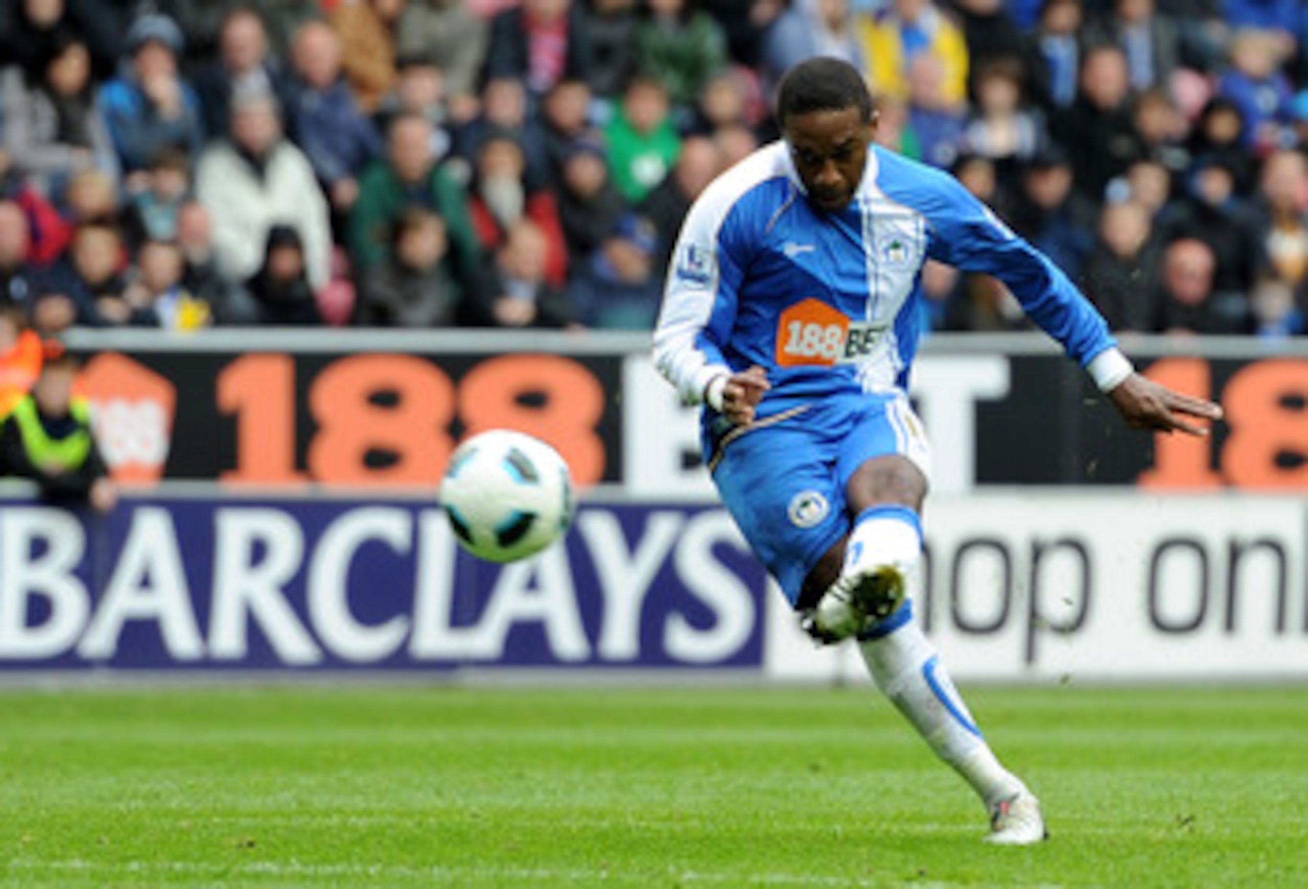 WIGAN, ENGLAND - MAY 15:  Charles N'Zogbia of Wigan Athletic scores his team's first goal during the Barclays Premier League match between Wigan Athletic and West Ham United at the DW Stadium on May 15, 2011 in Wigan, England.  (Photo by Chris Brunskill/G