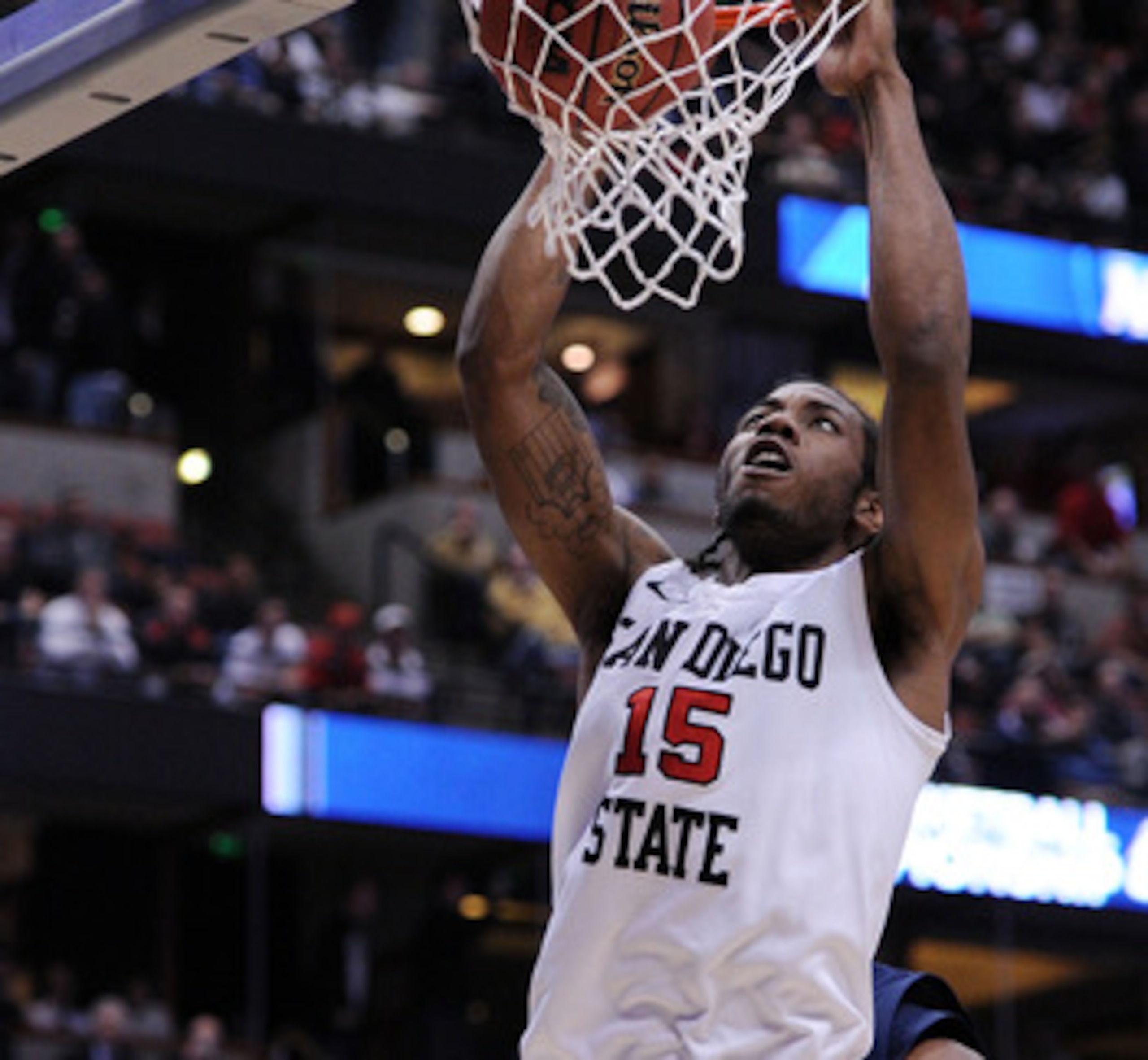 ANAHEIM, CA - MARCH 24: Kawhi Leonard #15 of the San Diego State Aztecs dunks the ball against the Connecticut Huskies during the west regional semifinal of the 2011 NCAA men's basketball tournament at the Honda Center on March 24, 2011 in Anaheim, Calif ANAHEIM, CA - MARCH 24: Kawhi Leonard #15 of the San Diego State Aztecs dunks the ball against the Connecticut Huskies during the west regional semifinal of the 2011 NCAA men's basketball tournament at the Honda Center on March 24, 2011 in Anaheim, Calif