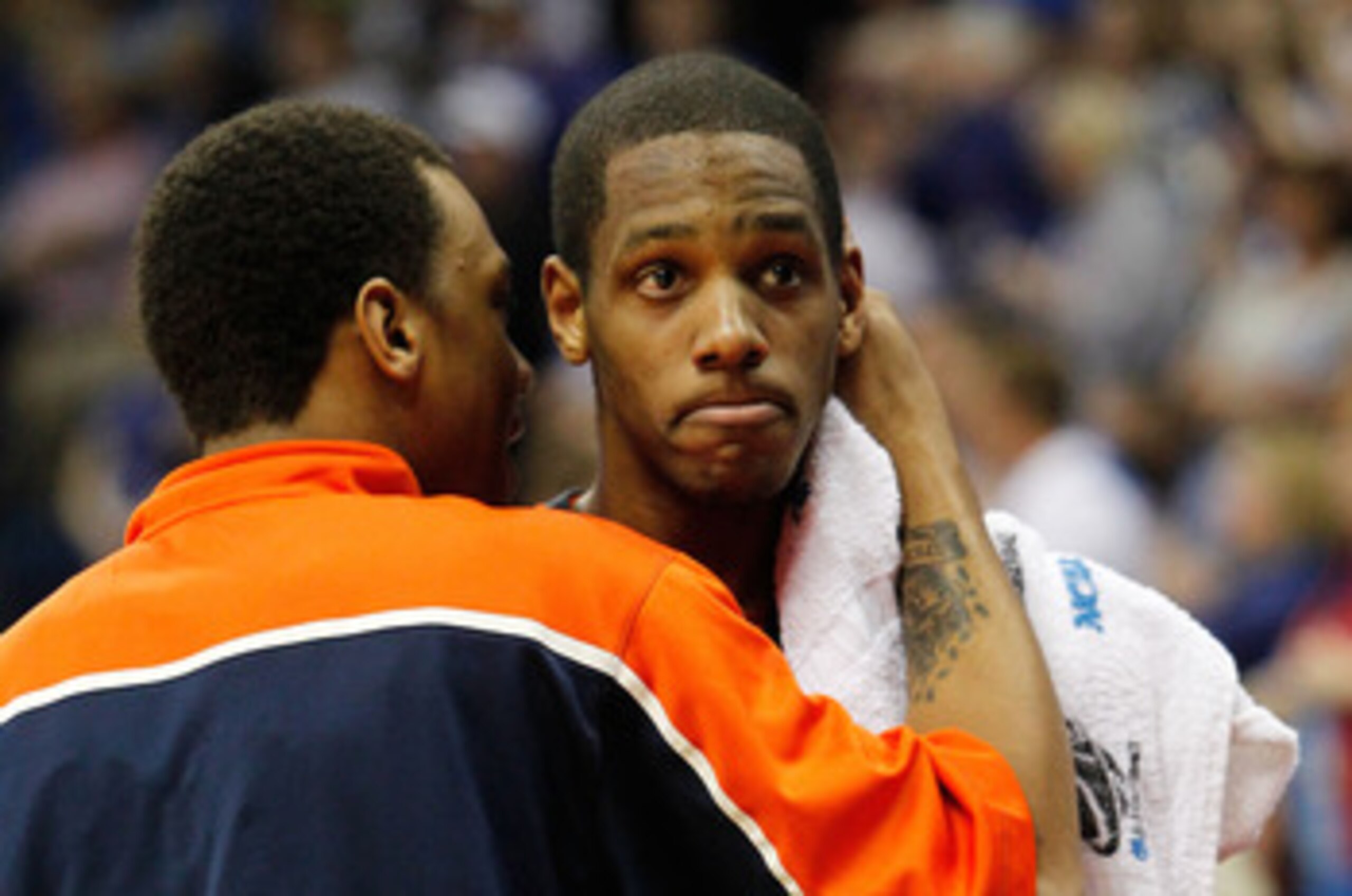 TULSA, OK - MARCH 20: Mike Davis #24 of the Illinois Fighting Illini is hugged by Jereme Richmond #22 in the final moments of their 59-73 loss to the Kansas Jayhawks the third round of the 2011 NCAA men's basketball tournament at BOK Center on March 20, TULSA, OK - MARCH 20: Mike Davis #24 of the Illinois Fighting Illini is hugged by Jereme Richmond #22 in the final moments of their 59-73 loss to the Kansas Jayhawks the third round of the 2011 NCAA men's basketball tournament at BOK Center on March 20,