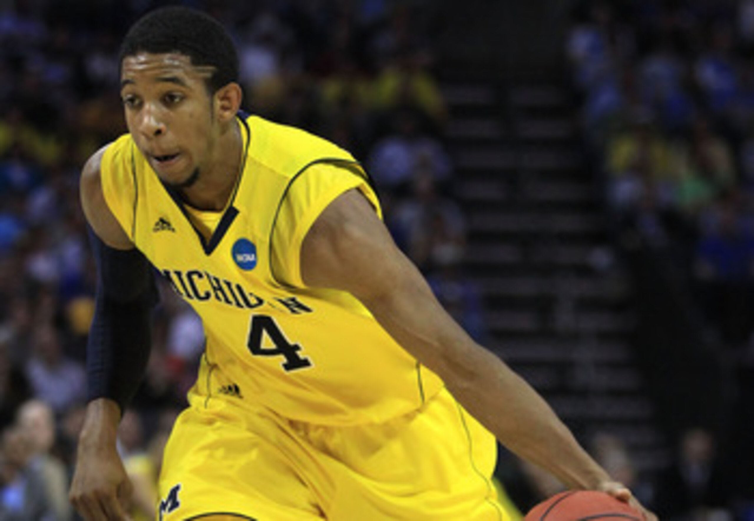 CHARLOTTE, NC - MARCH 20: Darius Morris #4 of the Michigan Wolverines moves the ball while taking on the Duke Blue Devils during the third round of the 2011 NCAA men's basketball tournament at Time Warner Cable Arena on March 20, 2011 in Charlotte, North CHARLOTTE, NC - MARCH 20: Darius Morris #4 of the Michigan Wolverines moves the ball while taking on the Duke Blue Devils during the third round of the 2011 NCAA men's basketball tournament at Time Warner Cable Arena on March 20, 2011 in Charlotte, North