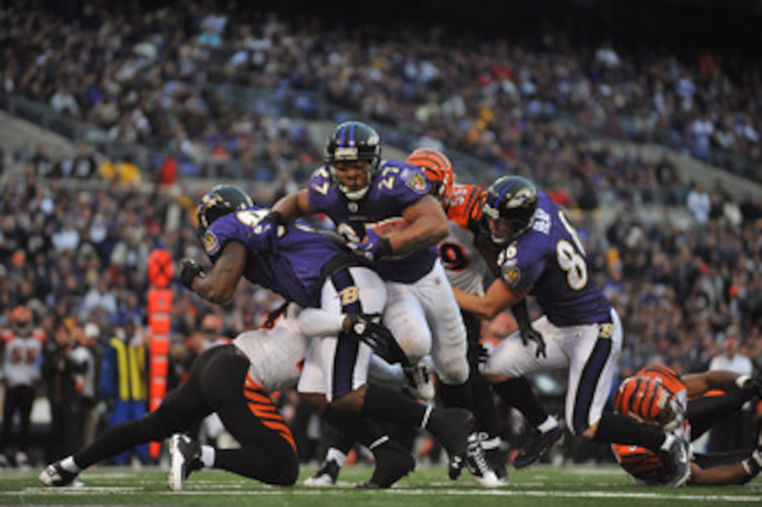BALTIMORE, MD - JANUARY 2:  Ray Rice #27 of the Baltimore Ravens scores his team's only touchdown against the Cincinnati Bengals  at M&T Bank Stadium on January 2, 2011 in Baltimore, Maryland. The Ravens defeated the Bengals 13-6. (Photo by Larry French/G