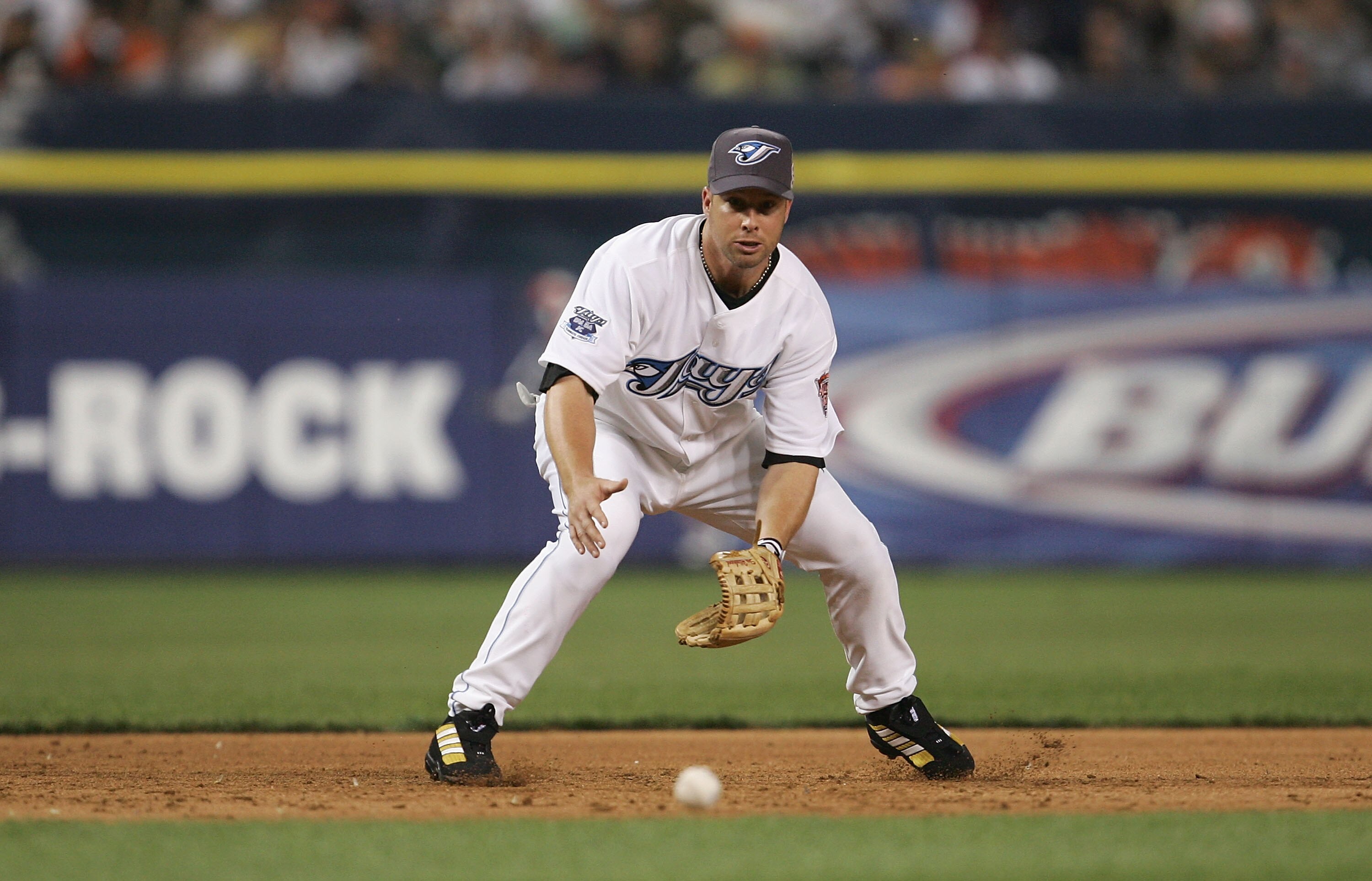 DETROIT - JULY 12:  American League All-Star Shea Hillenbrand of the Toronto Blue Jays fields an out against the National League All-Stars during the eighth inning of the 76th Major League Baseball All-Star Game on July 12, 2005 at Comerica Park in Detroi