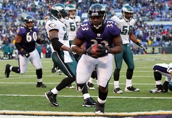 BALTIMORE - NOVEMBER 23:  LeRon McClain #33 of the Baltimore Ravens carries the ball into the endzone for a touchdown against the Philadelphia Eagles on November 23, 2008 at M&T Bank Stadium in Baltimore, Maryland. The Ravens defeated the Eagles 36-7.  (P