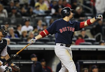 NEW YORK, NY - MAY 13: Adrian Gonzalez #28 of the Boston Red Sox drives in a run with a sacrifice fly against the New York Yankees during their game on May 13, 2011 at Yankee Stadium in the Bronx borough of New York City. (Photo by Al Bello/Getty Images NEW YORK, NY - MAY 13: Adrian Gonzalez #28 of the Boston Red Sox drives in a run with a sacrifice fly against the New York Yankees during their game on May 13, 2011 at Yankee Stadium in the Bronx borough of New York City. (Photo by Al Bello/Getty Images