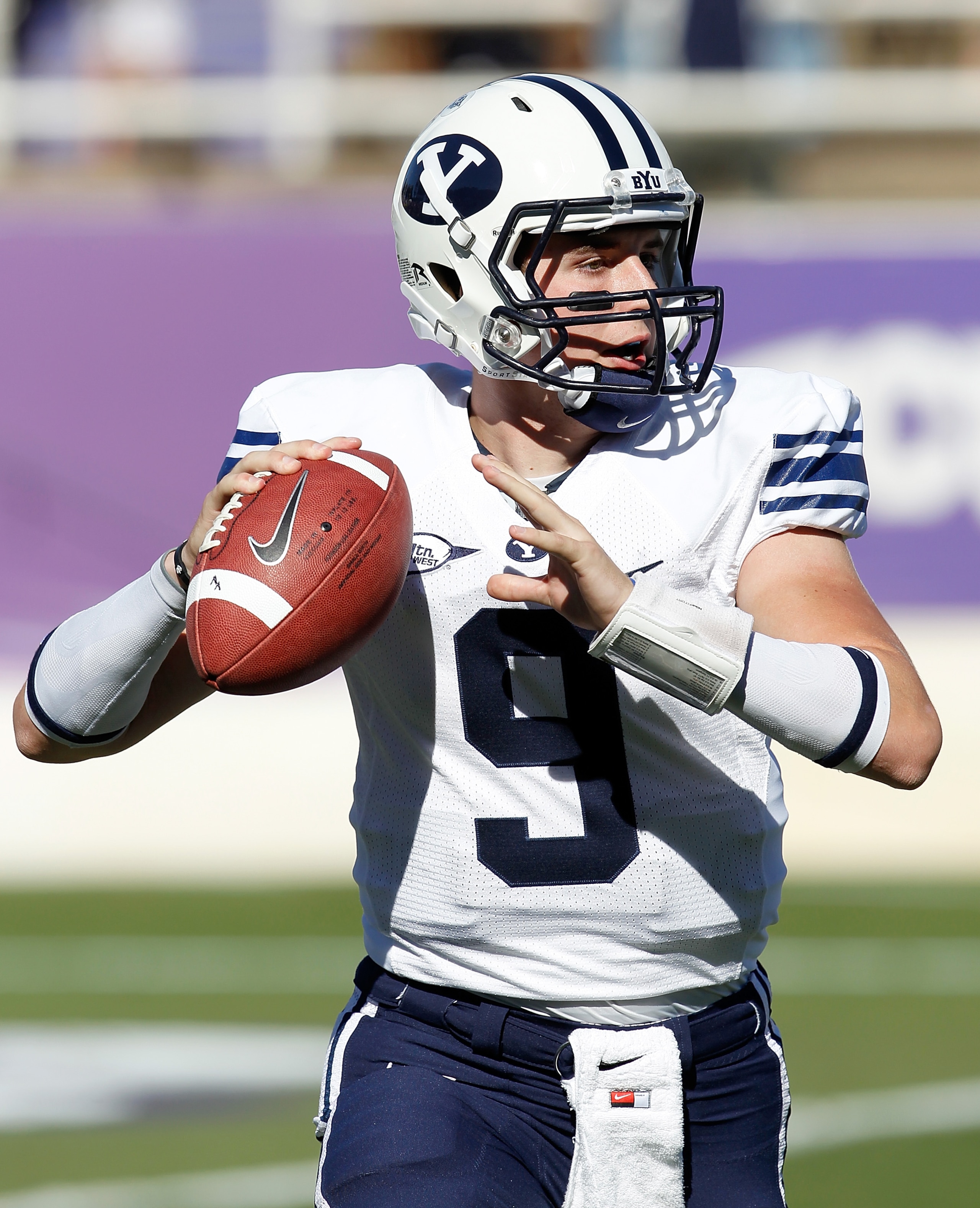 FORT WORTH, TX - OCTOBER 16:  Quarterback Jake Heaps #9 of the Brigham Young University Cougars throws a pass against the Texas Christian University Horned Frogs at Amon G. Carter Stadium on October 16, 2010 in Fort Worth, Texas.  (Photo by Tom Pennington