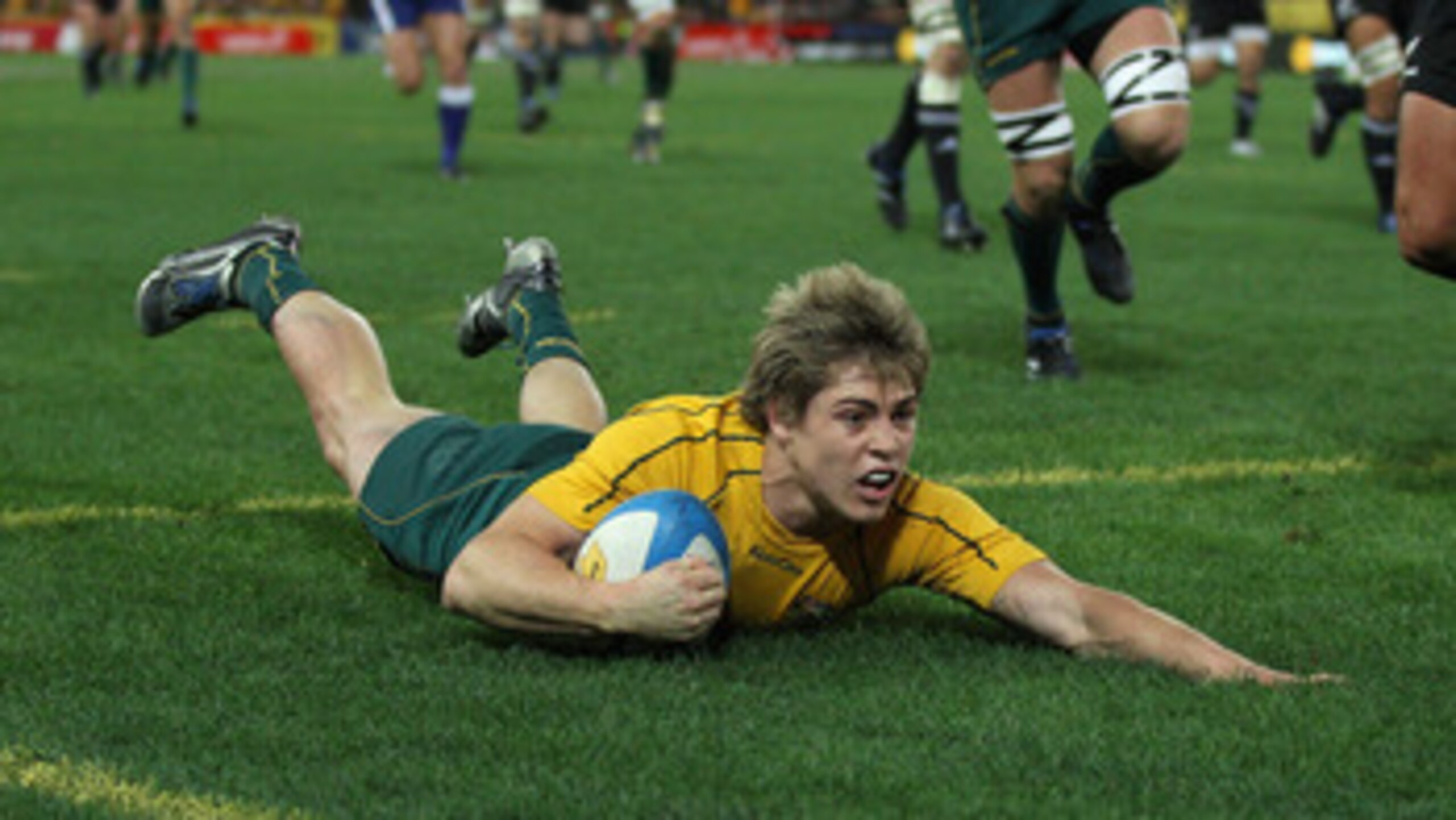 SYDNEY, AUSTRALIA - SEPTEMBER 11:  James O'Connor of the Wallabies scores a try during the 2010 Tri-Nations Bledisloe Cup match between the Australian Wallabies and the New Zealand All Blacks at ANZ Stadium on September 11, 2010 in Sydney, Australia.  (Ph