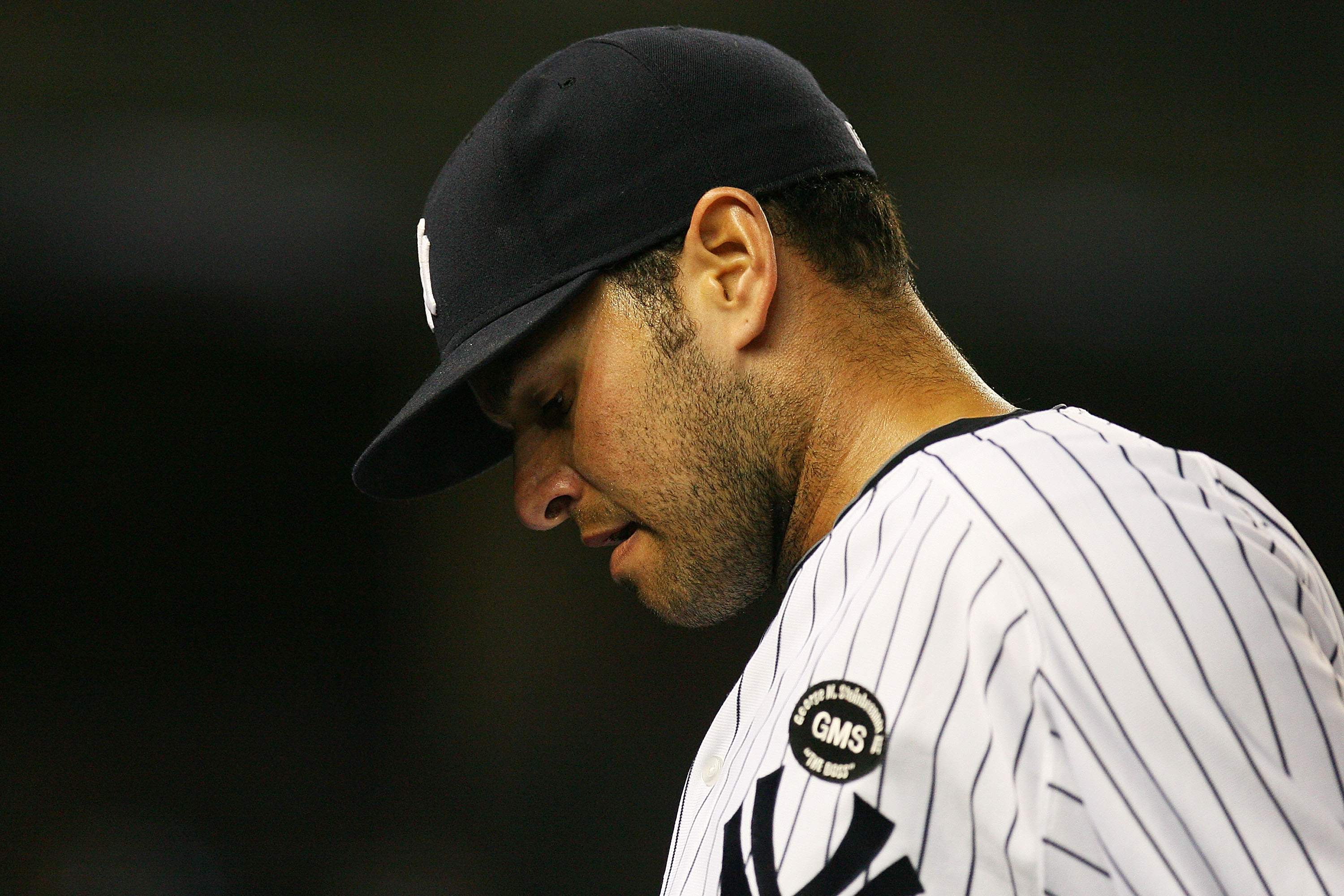 NEW YORK - SEPTEMBER 22:  Jonathan Albaladejo #63 of the New York Yankees walks back to the dug out during a game against the Tampa Bay Rays on September 22, 2010 at Yankee Stadium in the Bronx borough of New York City.  (Photo by Andrew Burton/Getty Imag