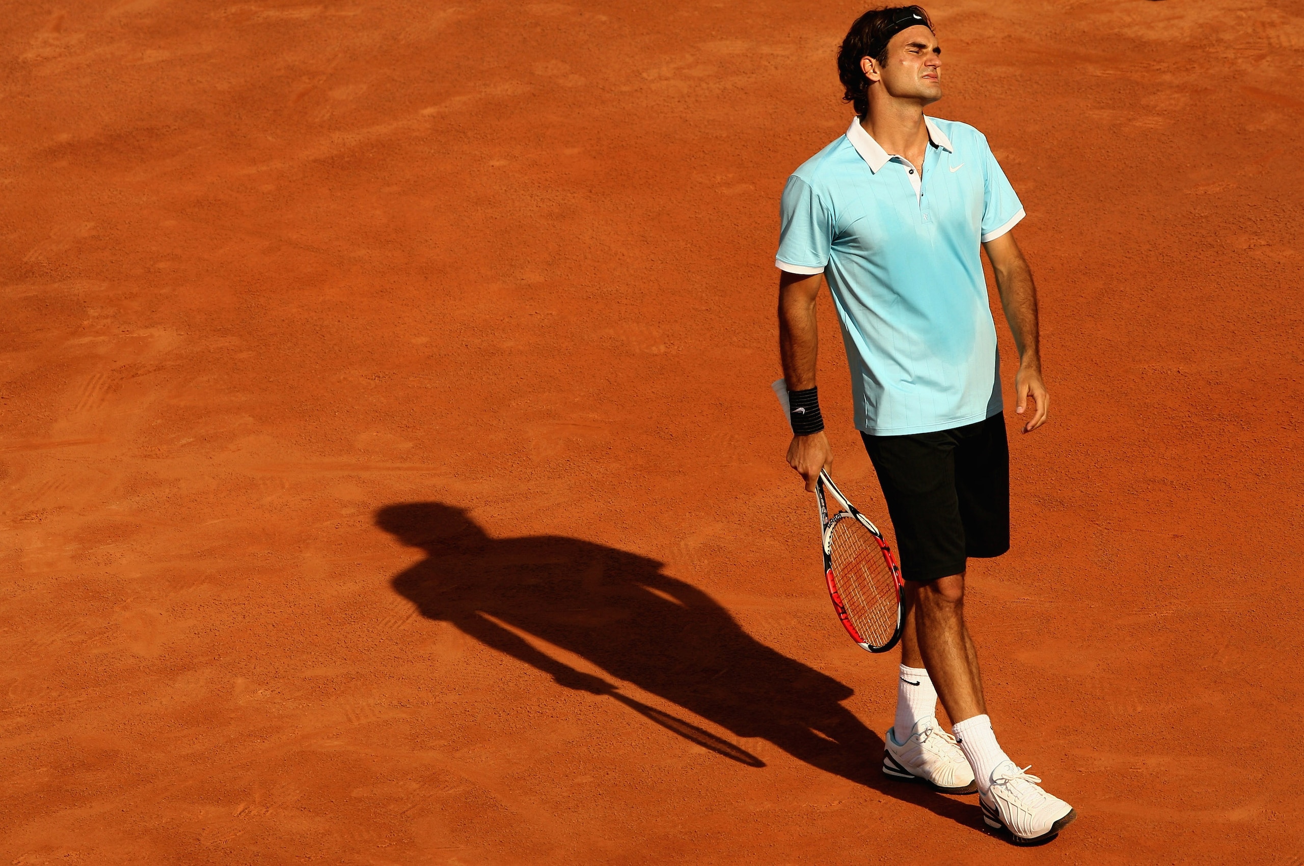 ROME - MAY 09: Roger Federer of Switzerland shows his dejection as he loses in straight sets against Radek Stepanek of the Czech Republic during their quarter-final match at the ATP Masters Series at the Foro Italico, on May 9, 2008 in Rome, Italy.  (Phot