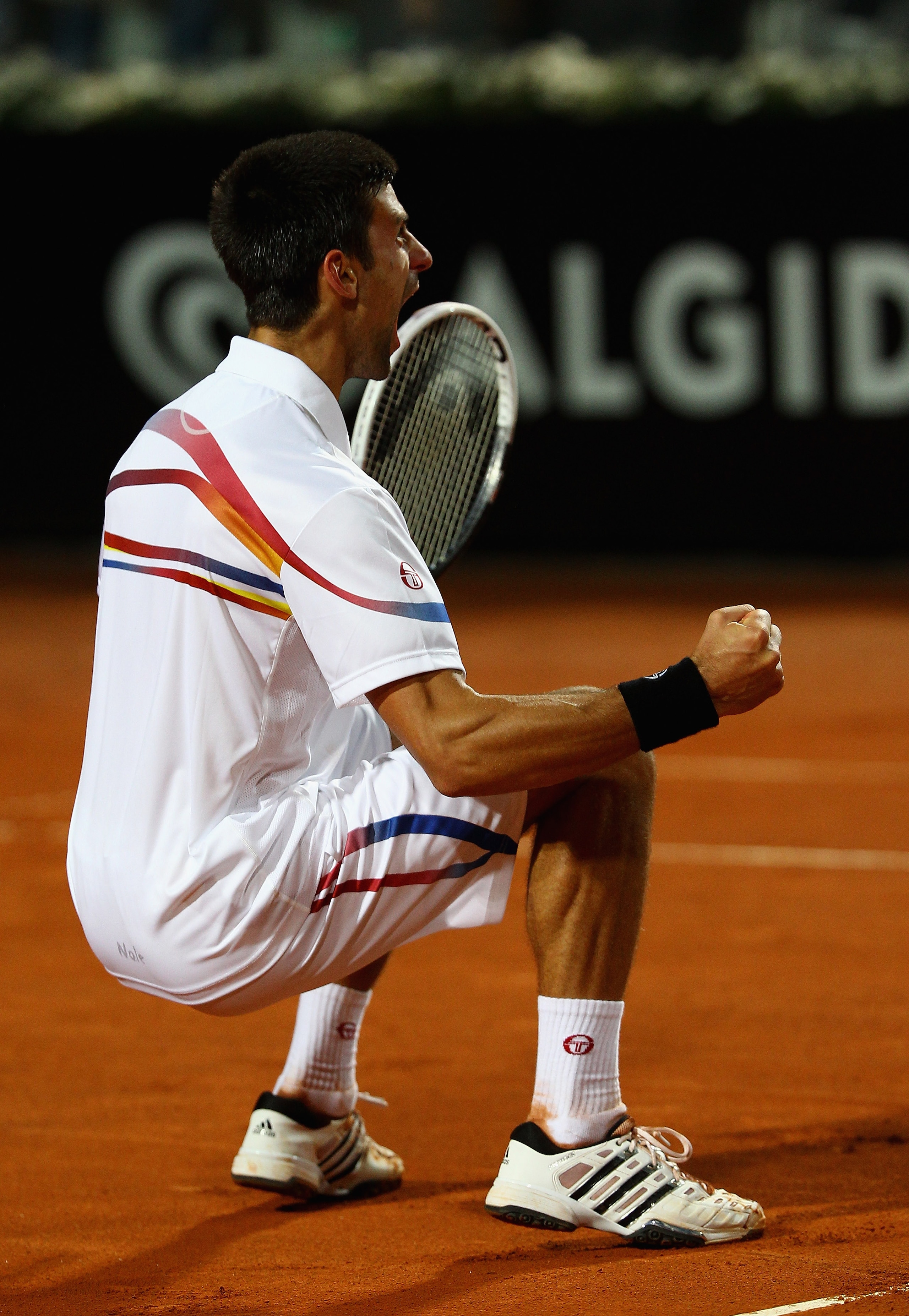 ROME, ITALY - MAY 15:  Novak Djokovic of Serbia celebrates match point during the final against Rafael Nadal of Spain during day eight of the Internazoinali BNL D'Italia at the Foro Italico Tennis Centre on May 15, 2011 in Rome, Italy.  (Photo by Clive Br