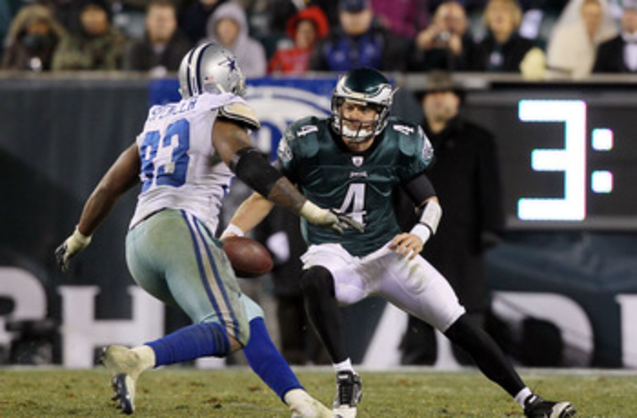 PHILADELPHIA, PA - JANUARY 02:  Kevin Kolb #4 of the Philadelphia Eagles tries to avoid a sack from Anthony Spencer #93 of the Dallas Cowboys on January 2, 2011 at Lincoln Financial Field in Philadelphia, Pennsylvania. The Cowboys defeated the Eagles 14-1