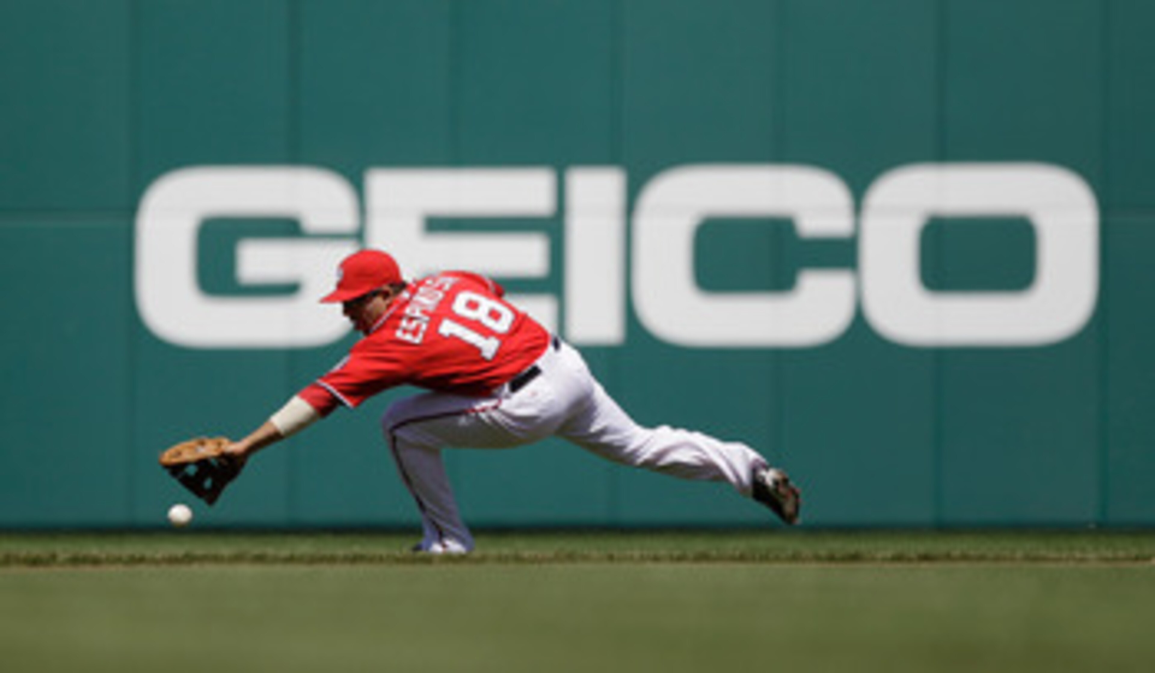 WASHINGTON, DC - APRIL 17: Danny Espinosa #18 of the Washington Nationals in action against the Milwaukee Brewers at Nationals Park on April 17, 2011 in Washington, DC.  (Photo by Rob Carr/Getty Images)