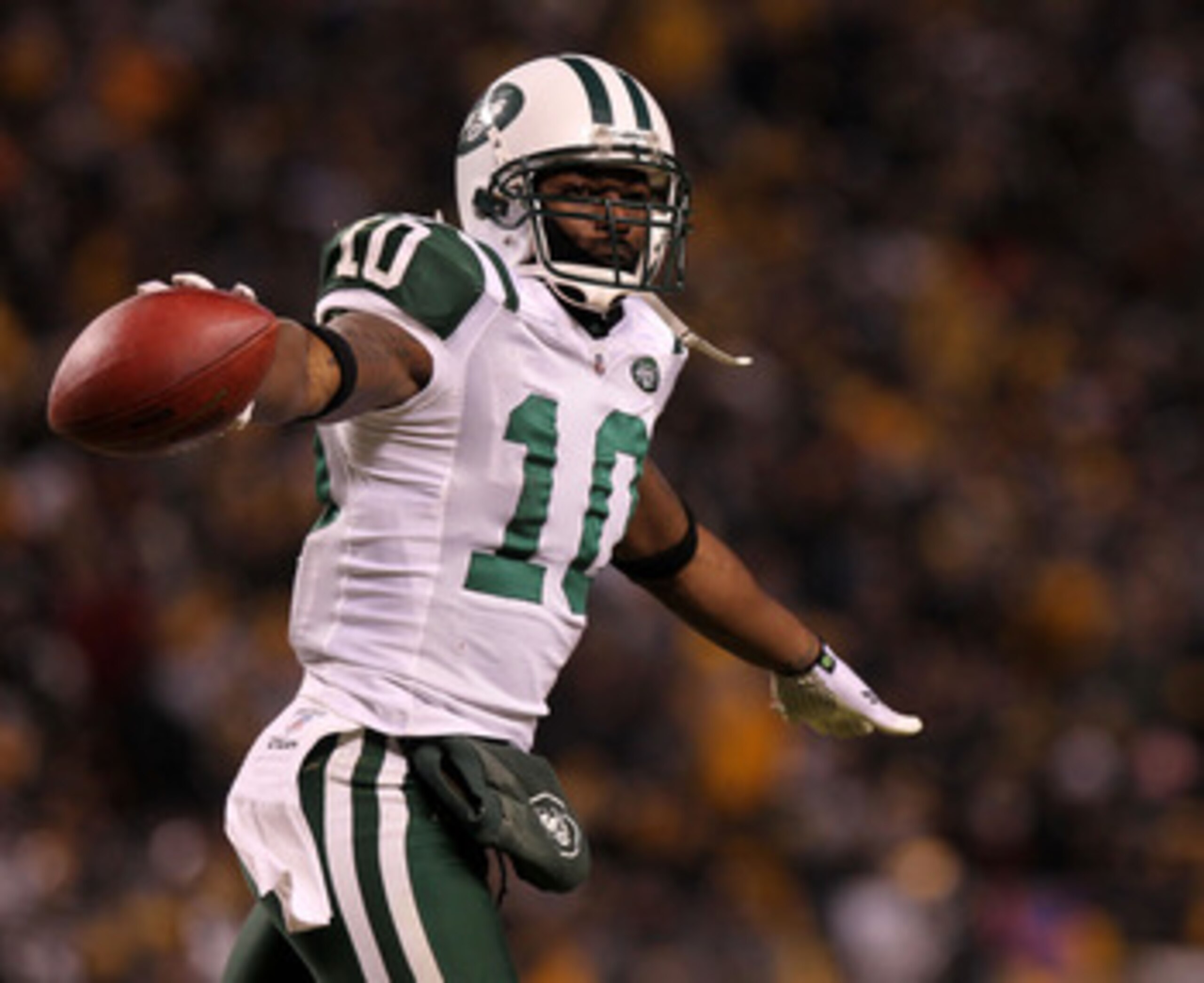 PITTSBURGH, PA - JANUARY 23:  Santonio Holmes #10 of the New York Jets celebrates after he scored a third quarter touchdown against the Pittsburgh Steelers during the 2011 AFC Championship game at Heinz Field on January 23, 2011 in Pittsburgh, Pennsylvani