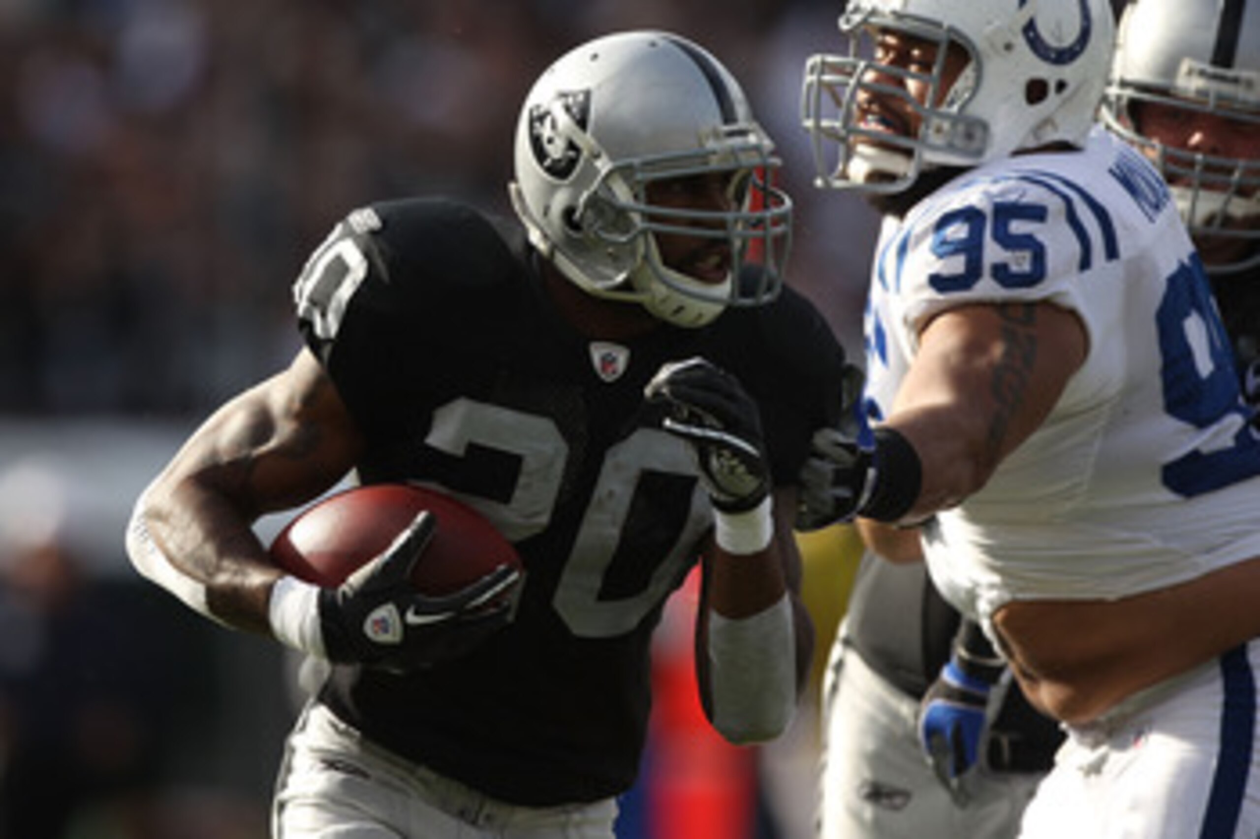 OAKLAND, CA - DECEMBER 26:  Darren McFadden #20 of the Oakland Raiders runs against Fili Moala #95 of the Indianapolis Colts during an NFL game at Oakland-Alameda County Coliseum on December  26, 2010 in Oakland, California.  (Photo by Jed Jacobsohn/Getty