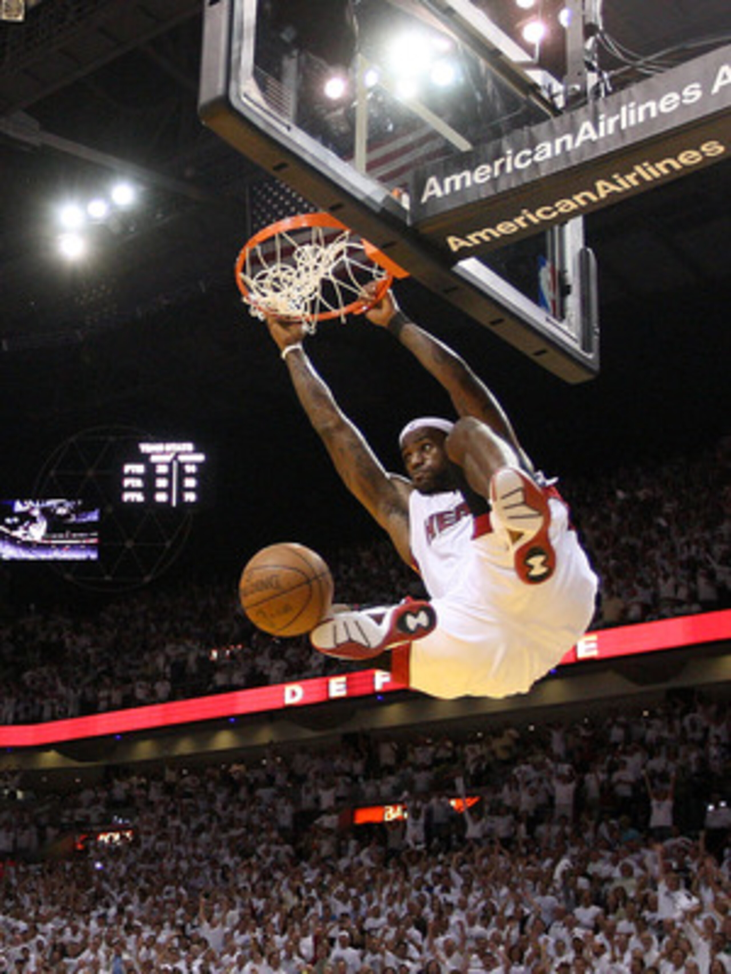 MIAMI, FL - MAY 11:  LeBron James #6 of the Miami Heat makes a late 4th quarter dunk during Game Five of the Eastern Conference Semifinals of the 2011 NBA Playoffs against the Boston Celtics at American Airlines Arena on May 11, 2011 in Miami, Florida. NO