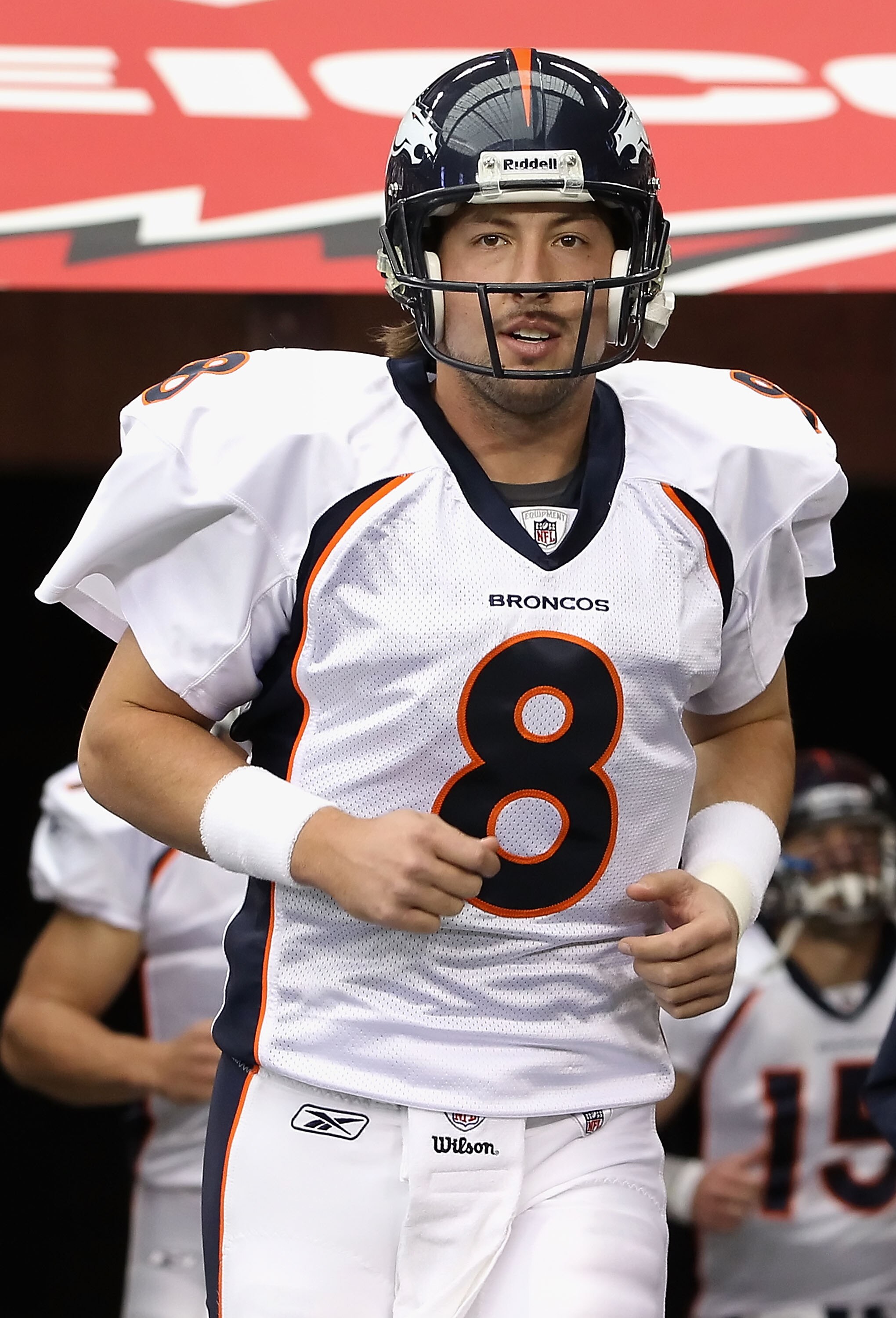 GLENDALE, AZ - DECEMBER 12:  Quarterback Kyle Orton #8 of the Denver Broncos runs out onto the field before the NFL game against the Arizona Cardinals at the University of Phoenix Stadium on December 12, 2010 in Glendale, Arizona.  (Photo by Christian Pet