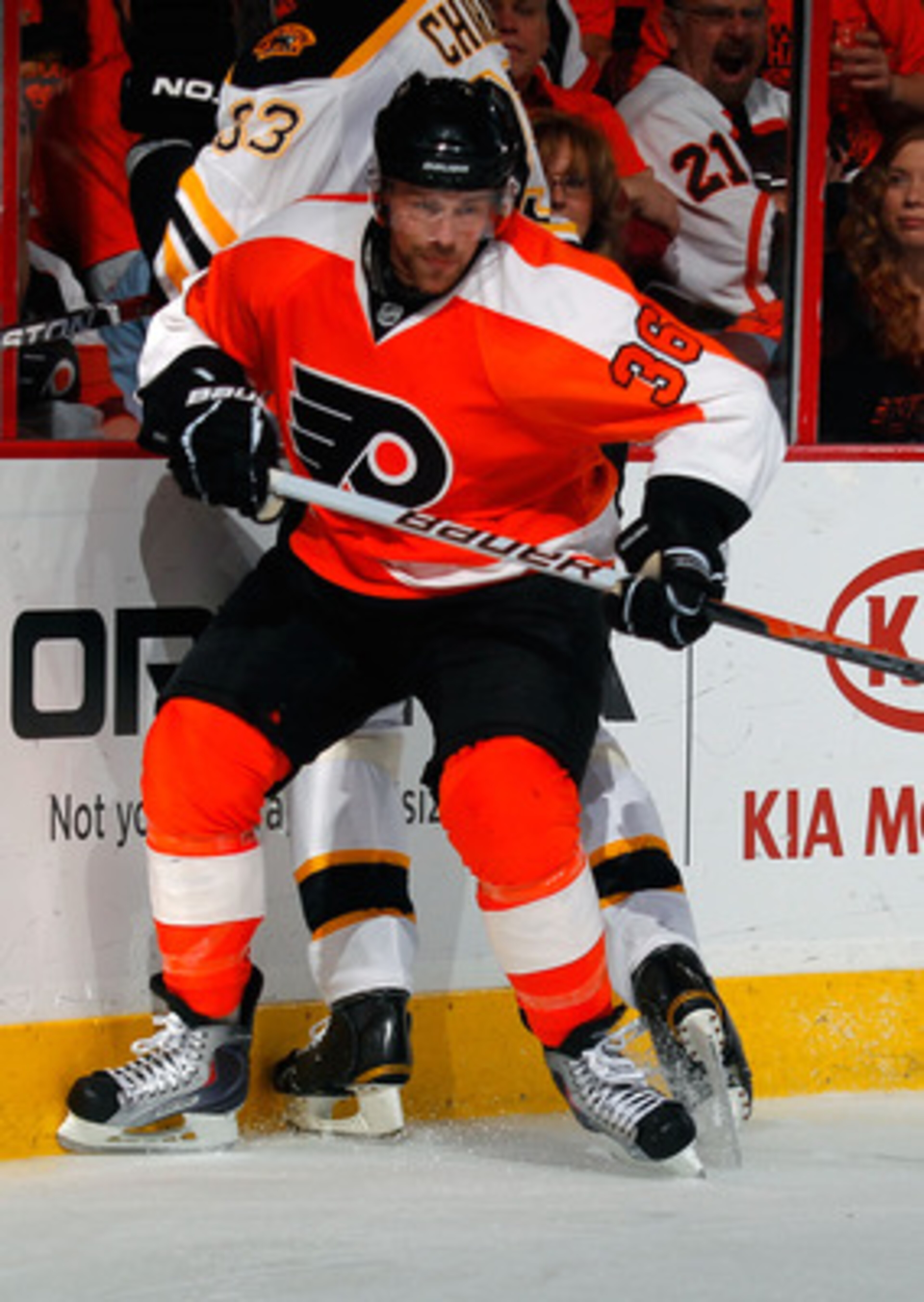 PHILADELPHIA, PA - MAY 02:  Darroll Powe #36 of the Philadelphia Flyers throws a check in Game Two of the Eastern Conference Semifinals against the Boston Bruins during the 2011 NHL Stanley Cup Playoffs at Wells Fargo Center on May 2, 2011 in Philadelphia
