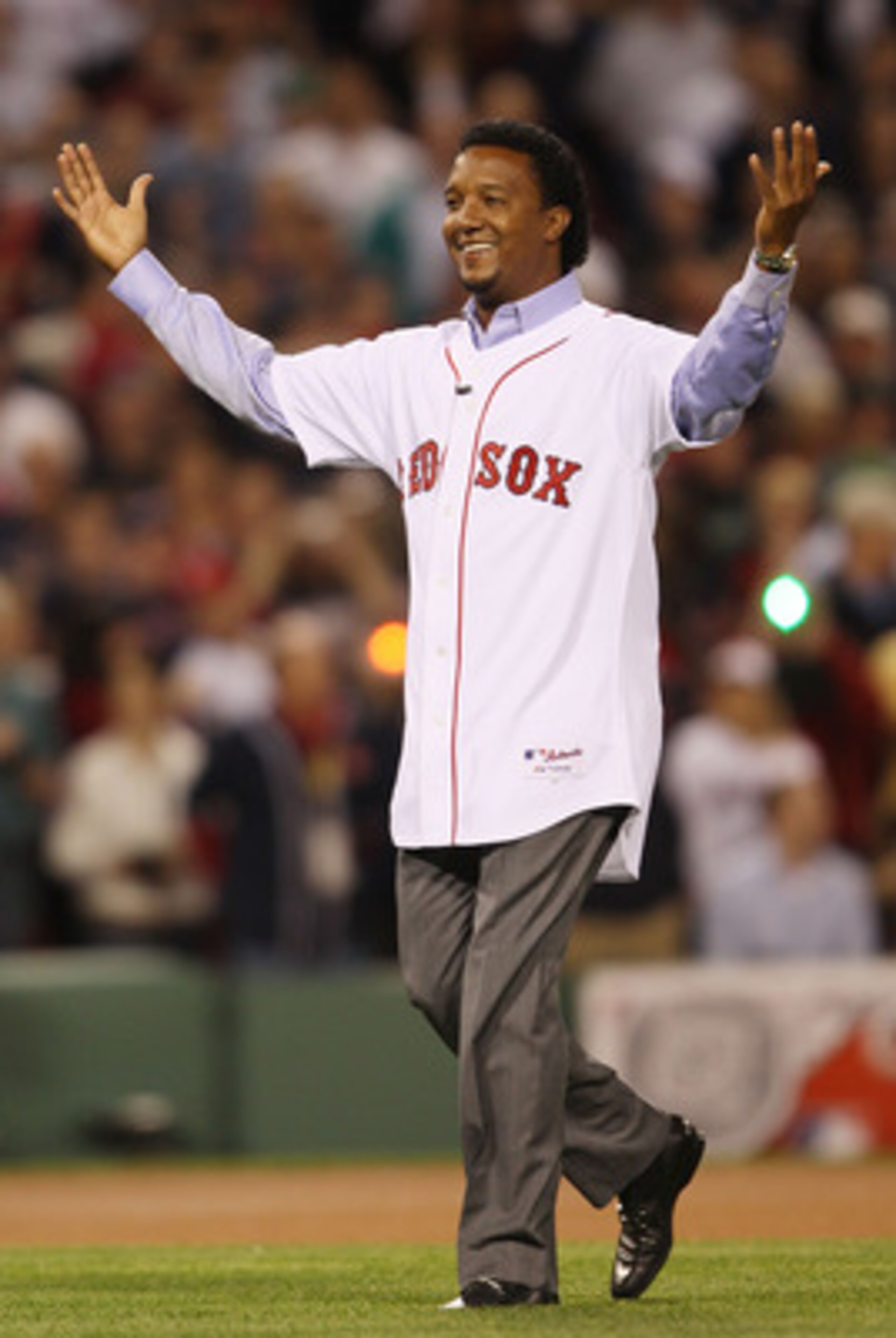 BOSTON - APRIL 04:  Former the Boston Red Sox pitcher Pedro Martinez greets the fans before the game against the New York Yankees on April 4, 2010 during Opening Night at Fenway Park in Boston, Massachusetts.  (Photo by Elsa/Getty Images)
