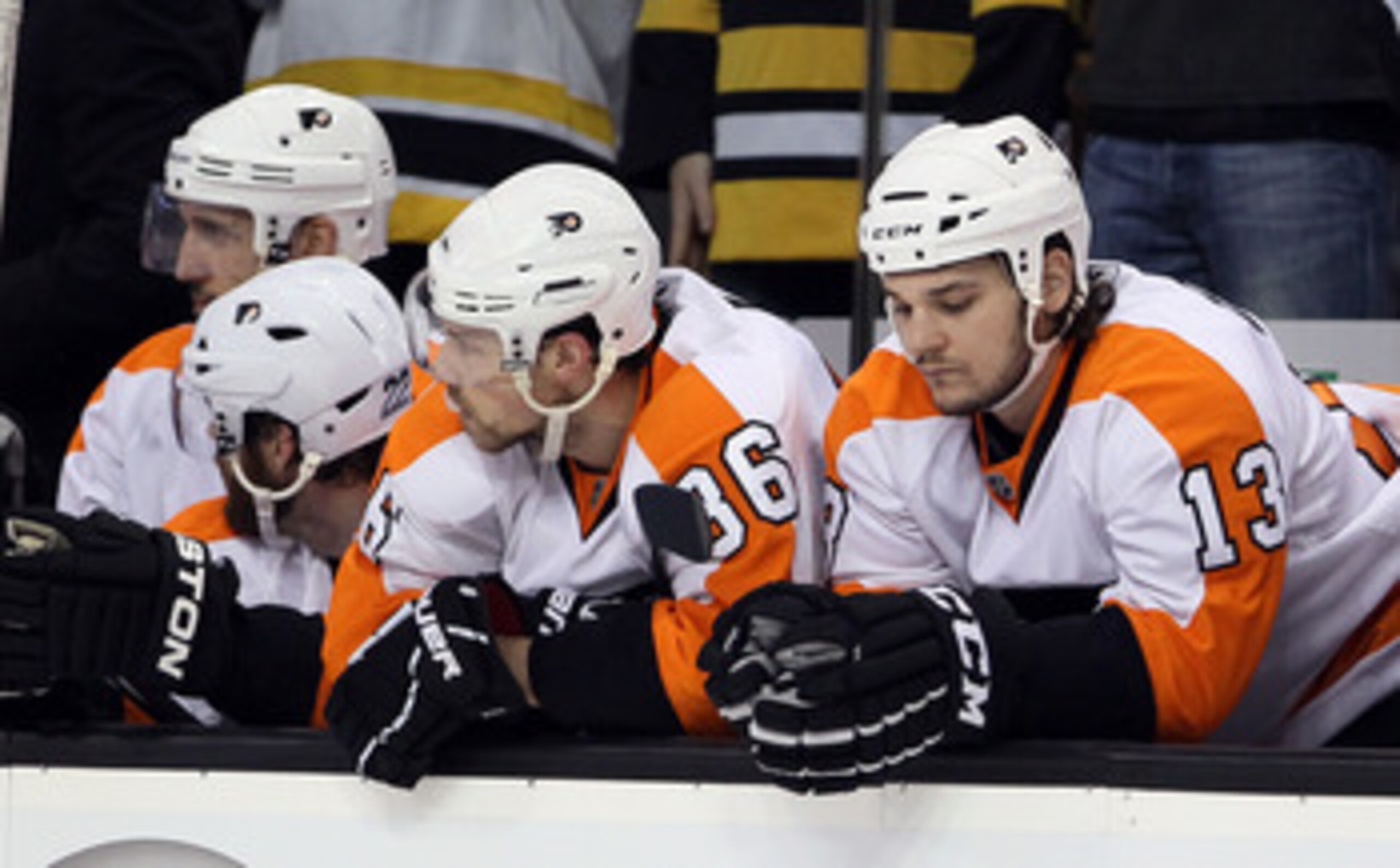 BOSTON, MA - MAY 06: Darroll Powe #36 and Daniel Carcillo #13 of the Philadelphia Flyers react late in the third period against the Boston Bruins in Game Four of the Eastern Conference Semifinals during the 2011 NHL Stanley Cup Playoffs at TD Garden on Ma