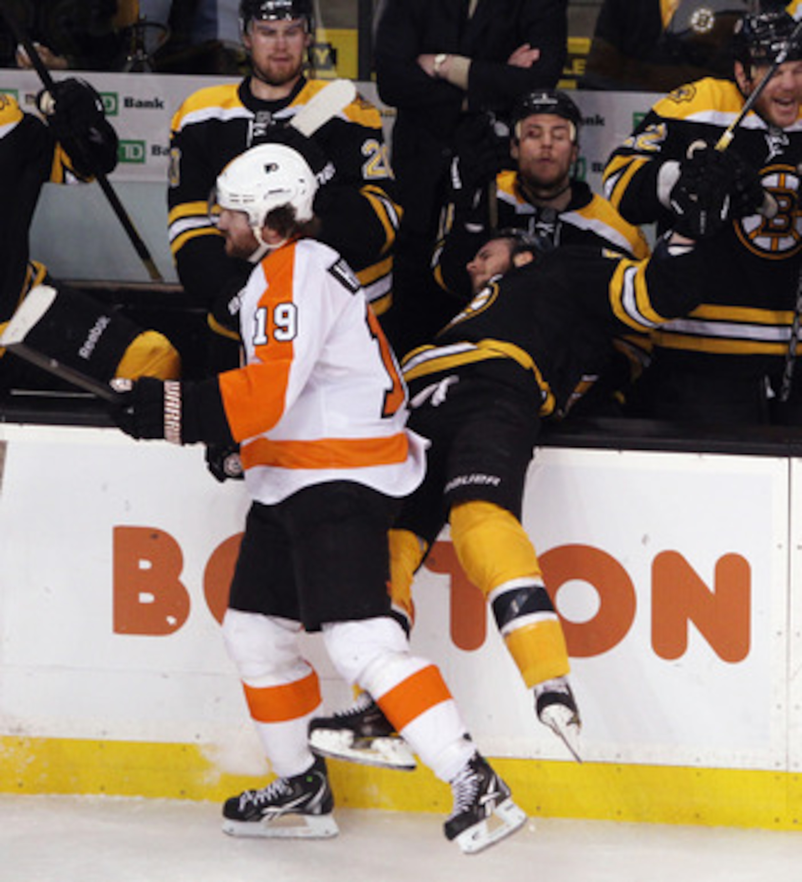 BOSTON, MA - MAY 06: Scott Hartnell #19 of the Philadelphia Flyers hits David Krejci #46 of the Boston Bruins into the boards in Game Four of the Eastern Conference Semifinals during the 2011 NHL Stanley Cup Playoffs at TD Garden on May 6, 2011 in Boston,