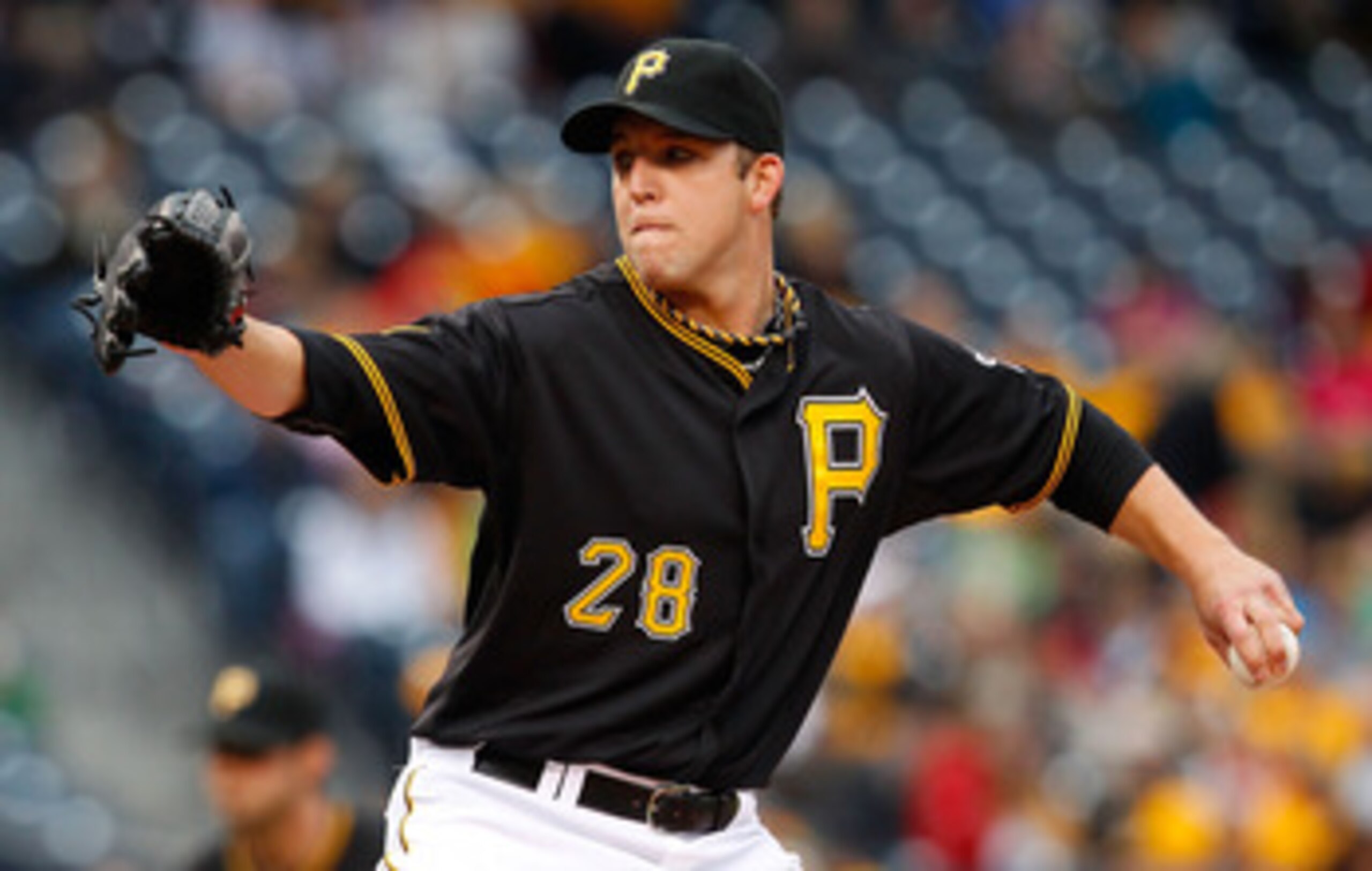 PITTSBURGH - MAY 06:  Paul Maholm #28 of the Pittsburgh Pirates pitches against the Houston Atros during the game on May 6, 2011 at PNC Park in Pittsburgh, Pennsylvania.  (Photo by Jared Wickerham/Getty Images)