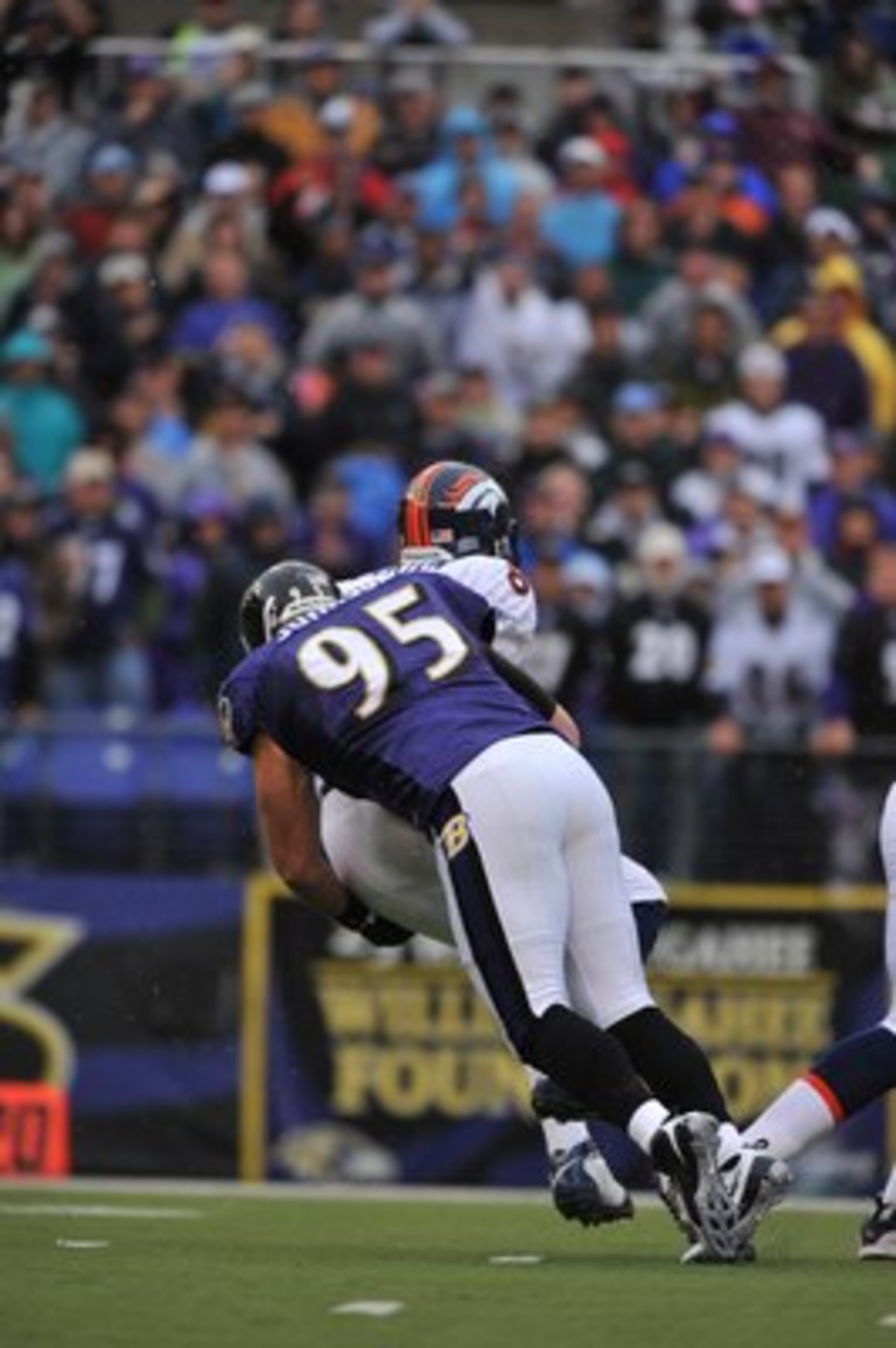 BALTIMORE - NOVEMBER 1:  Jarrett Johnson #95 of the Baltimore Ravens sacks Kyle Orton #8 of the Denver Broncos at M&T Bank Stadium on November 1, 2009 in Baltimore, Maryland. The Ravens defeated the Broncos 30-7. (Photo by Larry French/Getty Images)