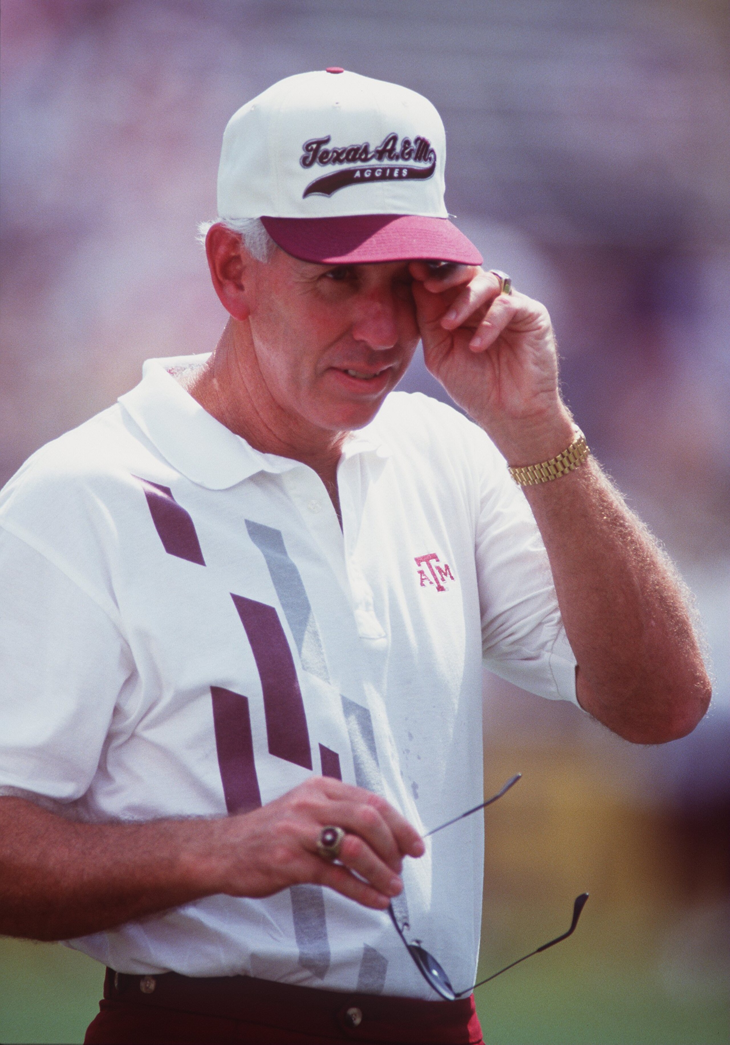 5 Sep 1992: Head coach R.C. Slocum of Texas A&M wipes hit brow during the Aggies 31-22 win over LSU at Kyle Field in College Station, Texas. 5 Sep 1992: Head coach R.C. Slocum of Texas A&M wipes hit brow during the Aggies 31-22 win over LSU at Kyle Field in College Station, Texas.