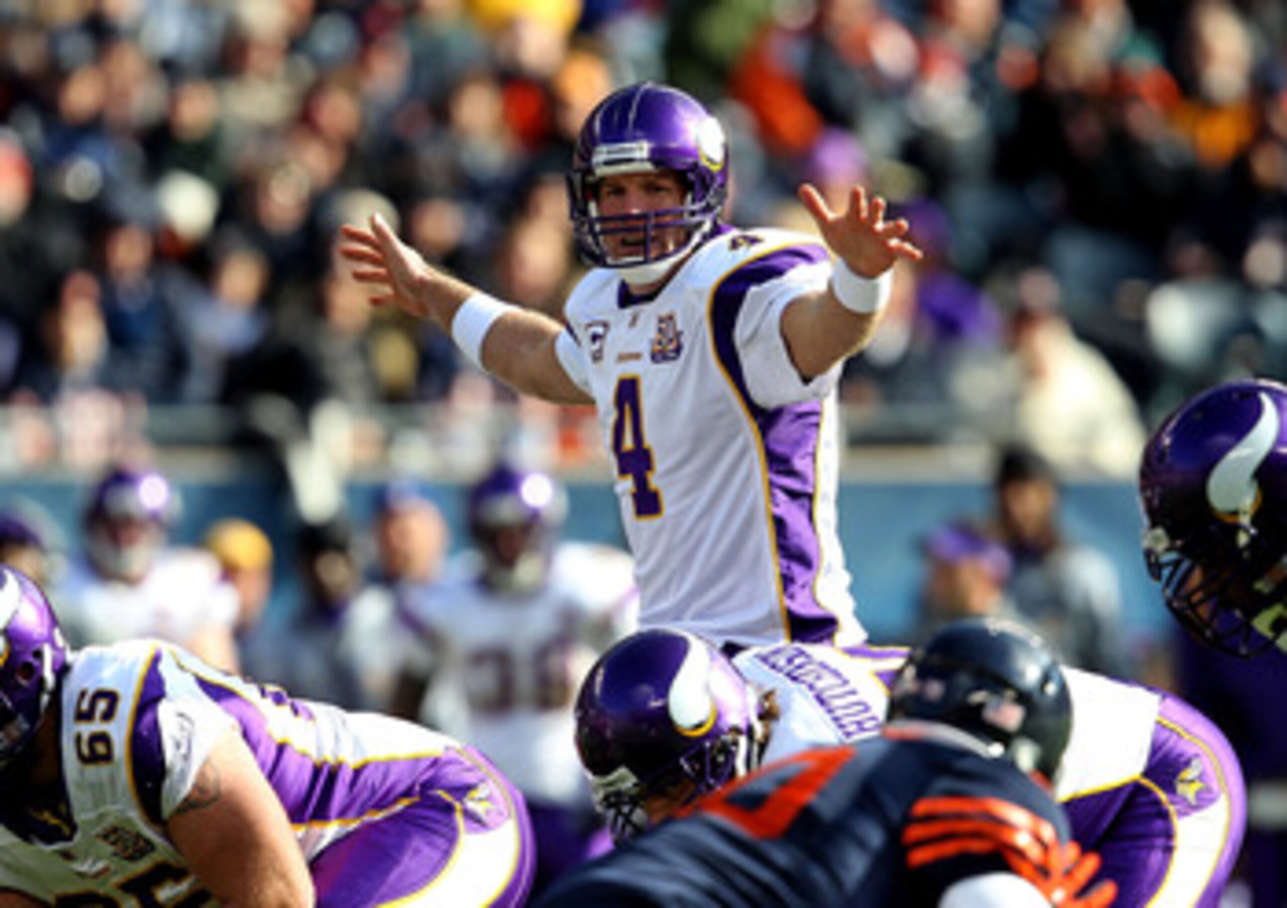 CHICAGO - NOVEMBER 14: Brett Favre #4 of the Minnesota Vikings looks over the Chicago Bear defense before taking the snap at Soldier Field on November 14, 2010 in Chicago, Illinois. The Bears defeated the Vikings 27-13. (Photo by Jonathan Daniel/Getty Ima