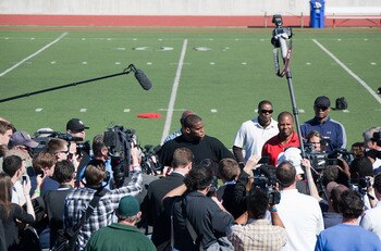 SAN DIEGO, CA - FEBRUARY 10: 2010 Heisman Trophy winning quarterback Cam Newton of Auburn answers questions after his workout routine for the media at Cathedral High School's sports stadium on February 10, 2011 in San Diego, California. (Photo by Kent Hor