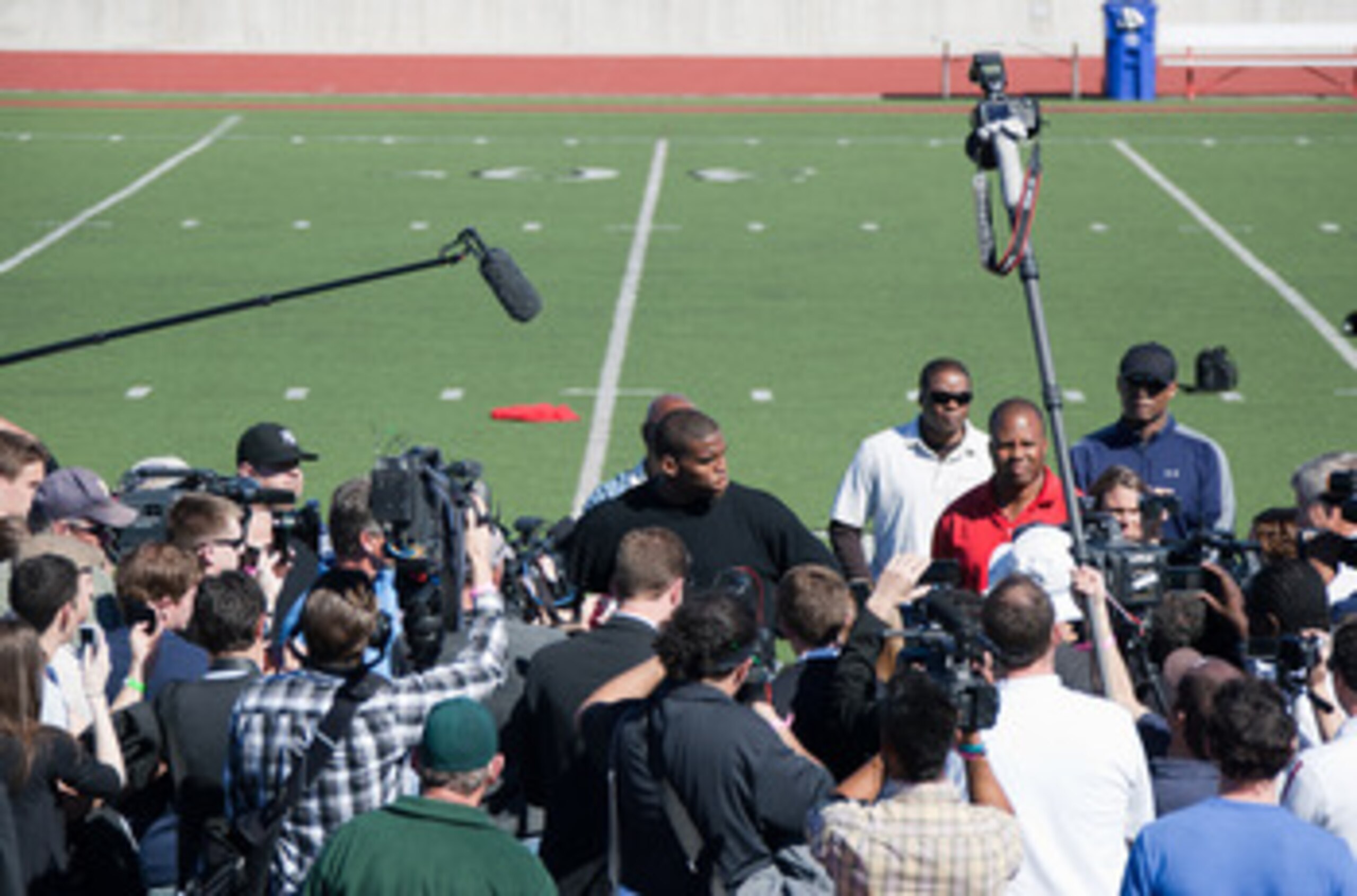 SAN DIEGO, CA - FEBRUARY 10: 2010 Heisman Trophy winning quarterback Cam Newton of Auburn answers questions after his workout routine for the media at Cathedral High School's sports stadium on February 10, 2011 in San Diego, California. (Photo by Kent Hor