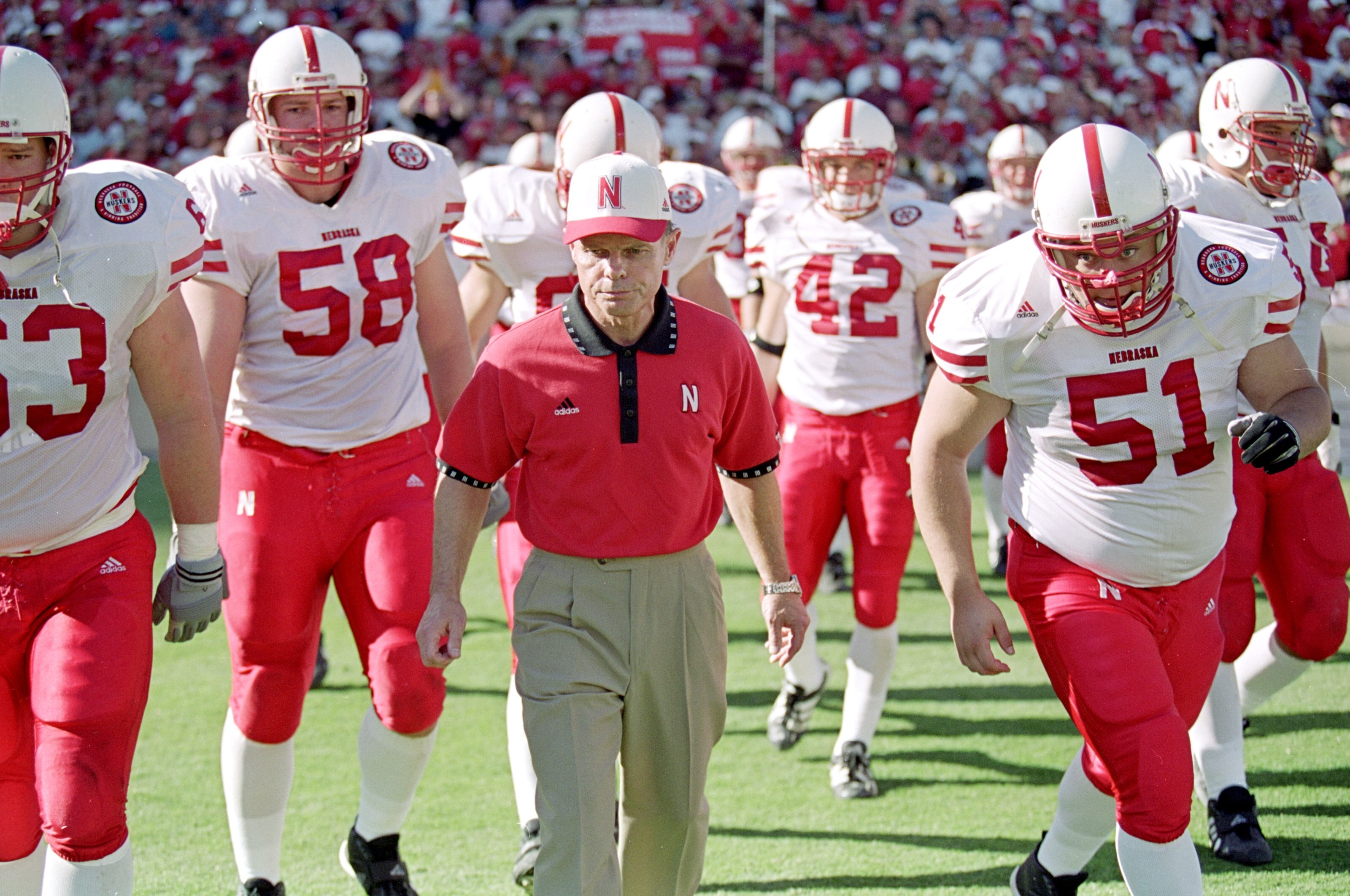 23 Oct 1999: Head coach Frank Solich of the Nebraska Cornhuskers walks out on the field with his players before a game against the Texas Longhorns at the Texas Memorial Stadium in Austin, Texas. The Longhorns defeated the Cornhuskers 24-20. Mandatory Cred