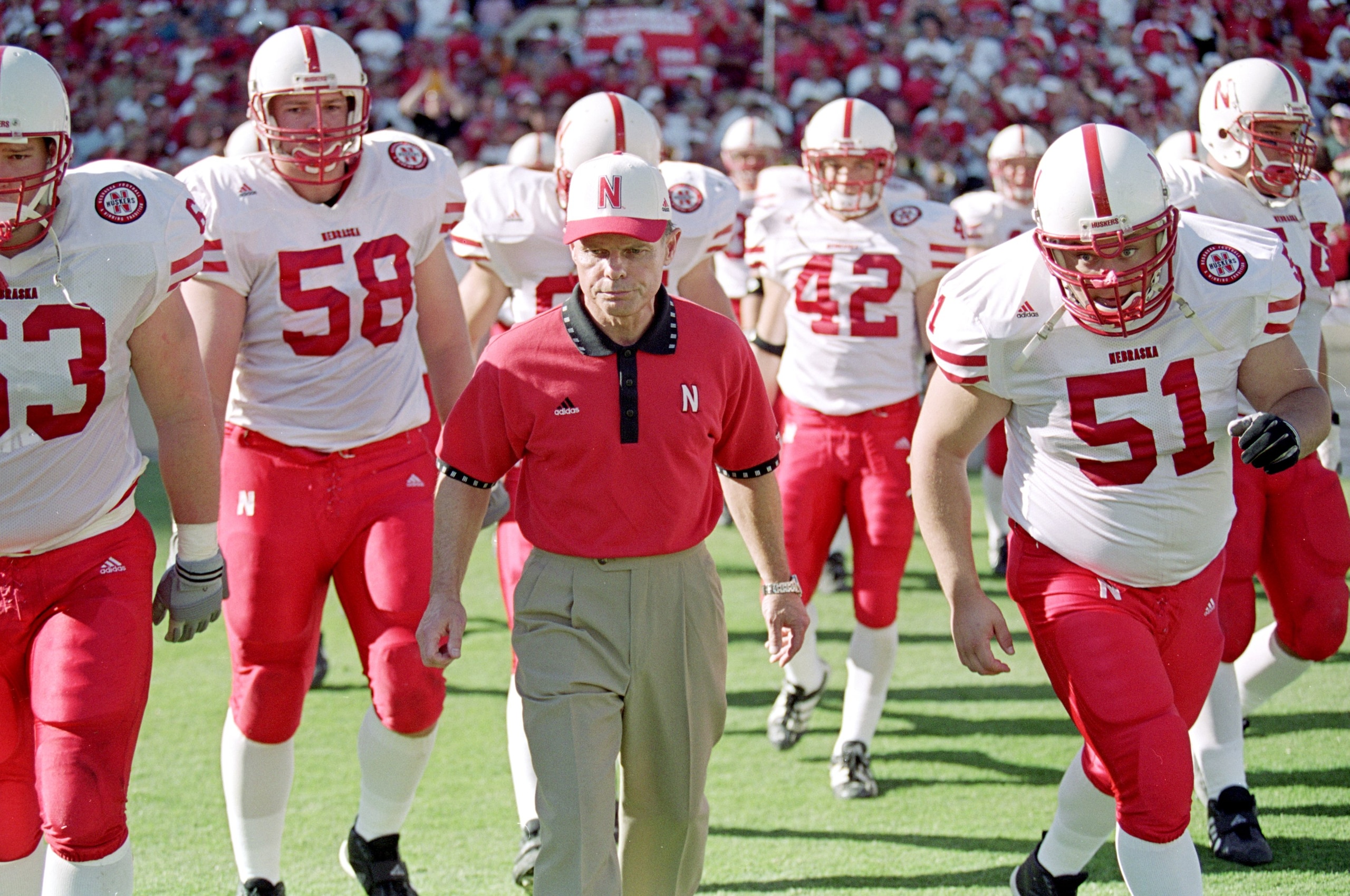23 Oct 1999: Head coach Frank Solich of the Nebraska Cornhuskers walks out on the field with his players before a game against the Texas Longhorns at the Texas Memorial Stadium in Austin, Texas. The Longhorns defeated the Cornhuskers 24-20. Mandatory Cred 23 Oct 1999: Head coach Frank Solich of the Nebraska Cornhuskers walks out on the field with his players before a game against the Texas Longhorns at the Texas Memorial Stadium in Austin, Texas. The Longhorns defeated the Cornhuskers 24-20. Mandatory Cred