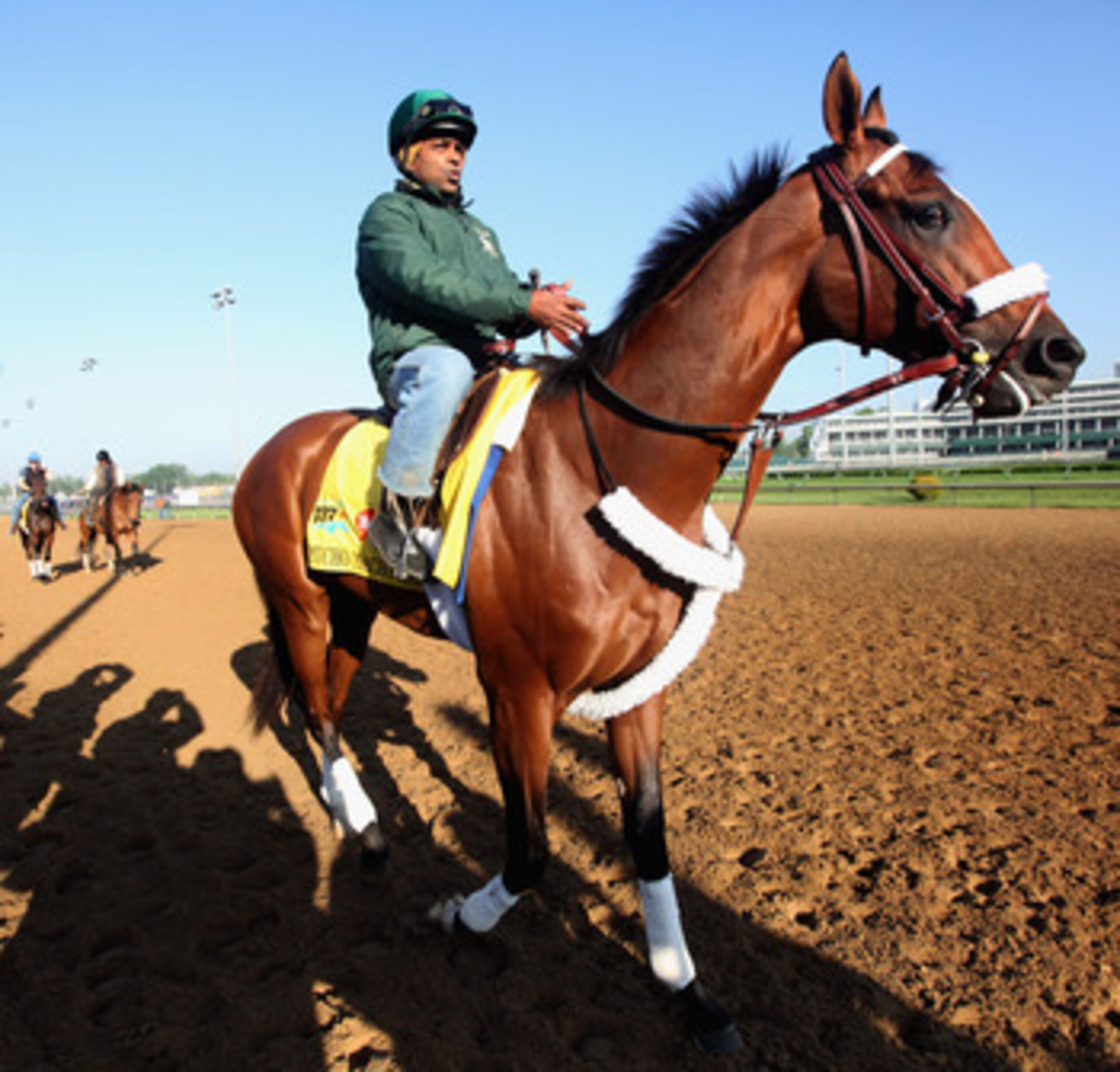 LOUISVILLE, KY - MAY 05: Kentucky Derby entrant Mucho Macho Man with exercise rider Mike Heera up works during morning workouts in preparation for the 137th running of the Kentucky Derby on May 5, 2011 at Churchill Downs in Louisville, Kentucky. (Photo LOUISVILLE, KY - MAY 05: Kentucky Derby entrant Mucho Macho Man with exercise rider Mike Heera up works during morning workouts in preparation for the 137th running of the Kentucky Derby on May 5, 2011 at Churchill Downs in Louisville, Kentucky. (Photo