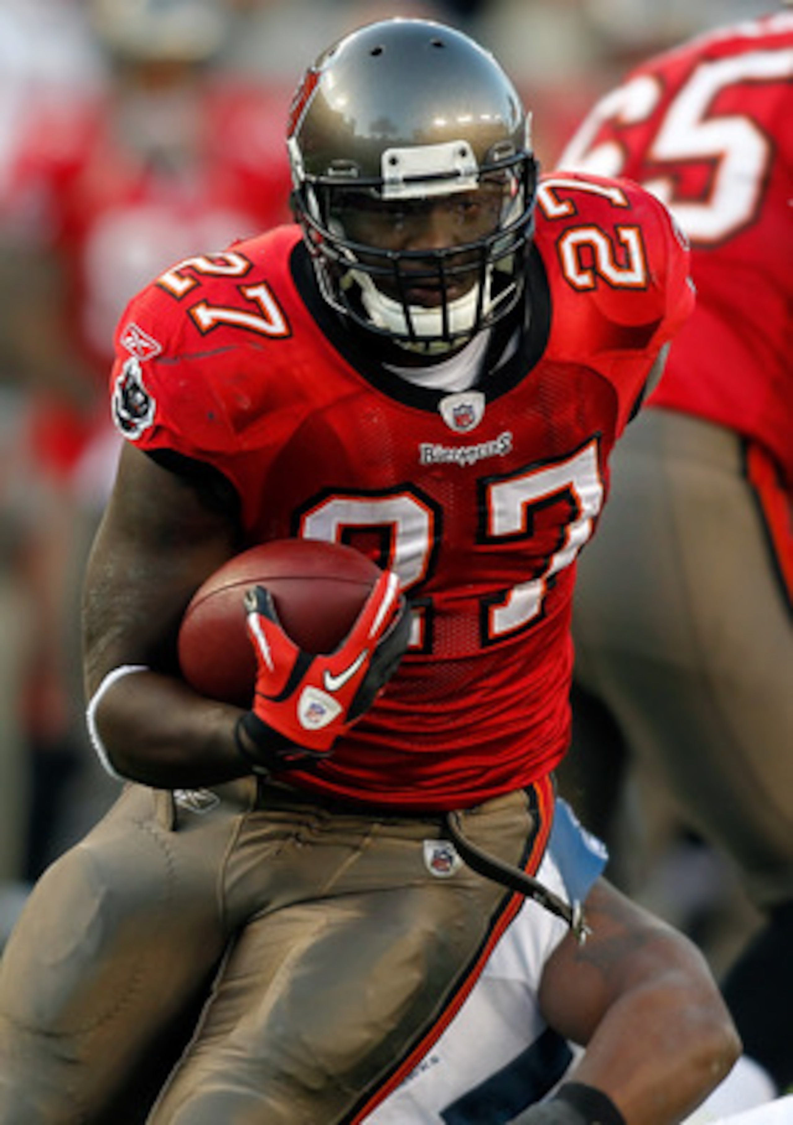 TAMPA, FL - DECEMBER 26: Running back LeGarrette Blount #27 of the Tampa Bay Buccaneers runs the ball against the Seattle Seahawks during the game at Raymond James Stadium on December 26, 2010 in Tampa, Florida. (Photo by J. Meric/Getty Images)