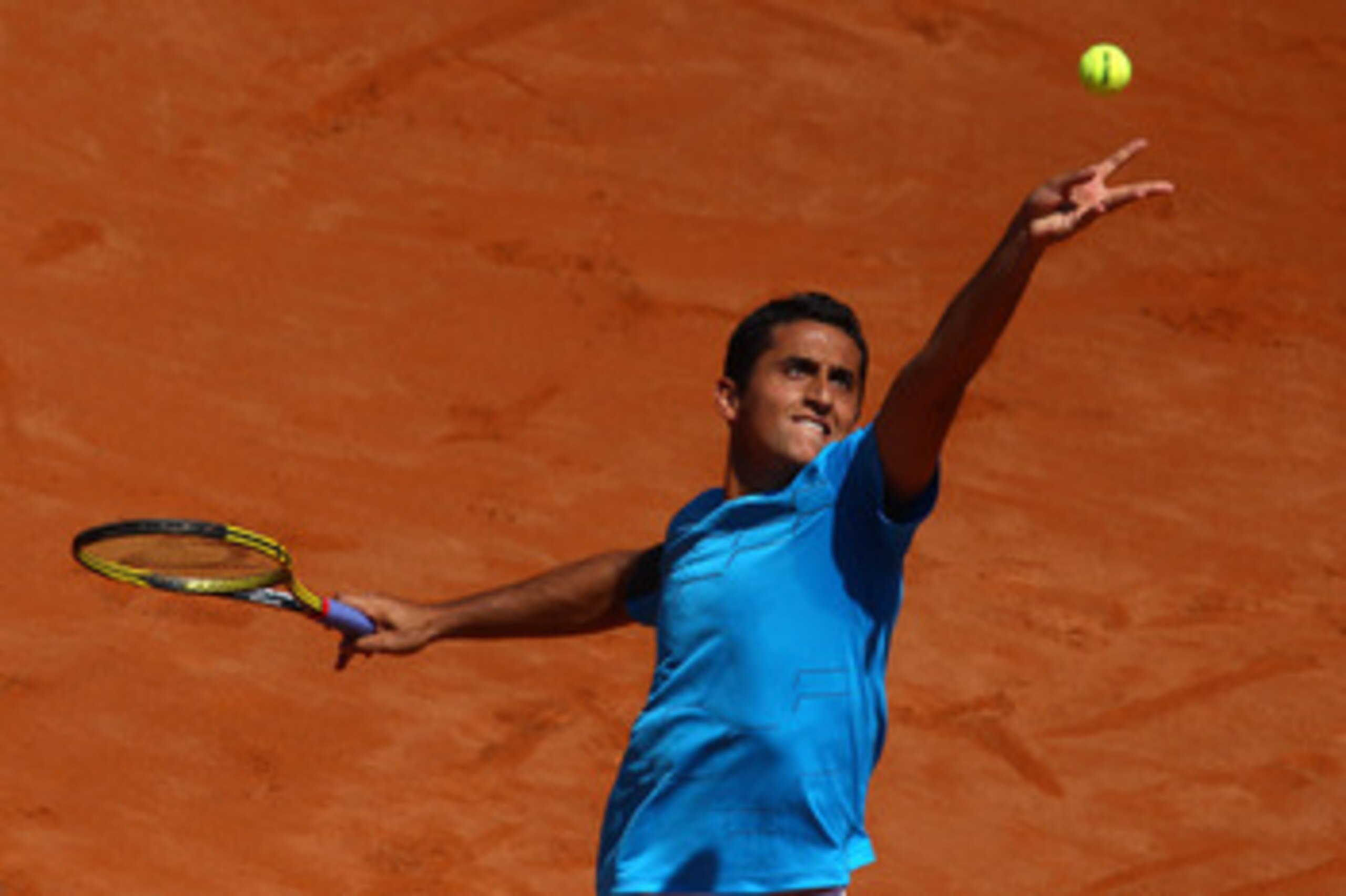 ROME, ITALY - MAY 10:  Nicolas Almagro of Spain serves during the his first round match against Simone Bolelli of Italy during day three of the Internazionali BNL d'Italia at the Foro Italico Tennis Centre on May 10, 2011 in Rome, Italy.  (Photo by Alex L