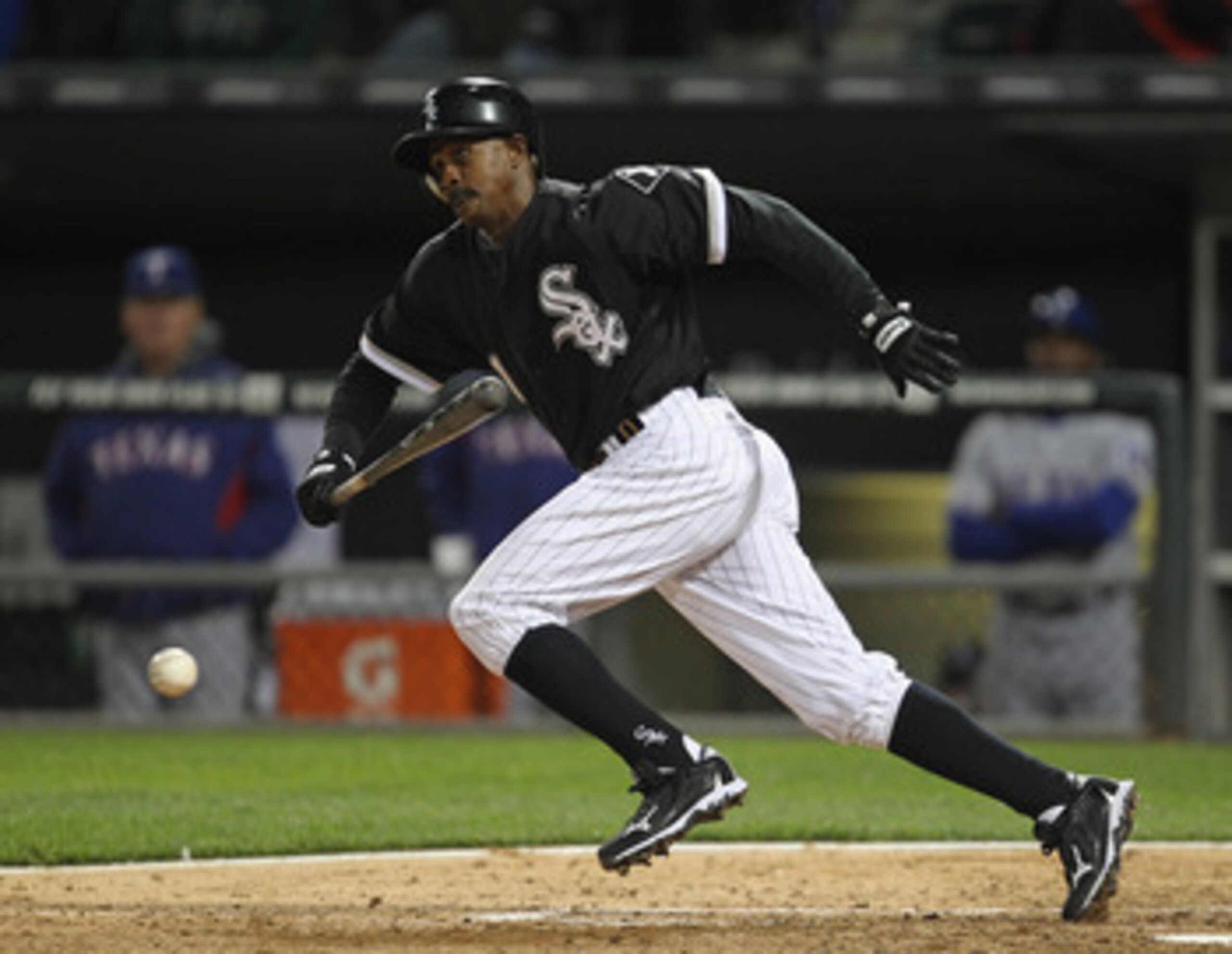 CHICAGO, IL - MAY 16: Juan Pierre #1 of the Chicago White Sox runs after a bunt against the Texas Rangers at U.S. Cellular Field on May 16, 2011 in Chicago, Illinois. The Rangers defeated the White Sox 4-0. (Photo by Jonathan Daniel/Getty Images)