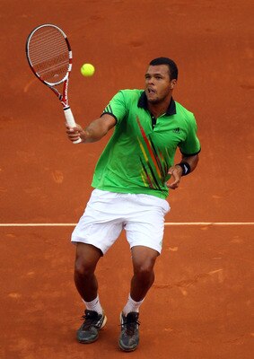 MADRID, SPAIN - MAY 01:  Jo-Wilfried Tsonga of France in action against Nicolas Almagro of Spain during day two of the Mutua Madrilena Madrid Open Tennis on May 1, 2011 in Madrid, Spain.  (Photo by Julian Finney/Getty Images)
