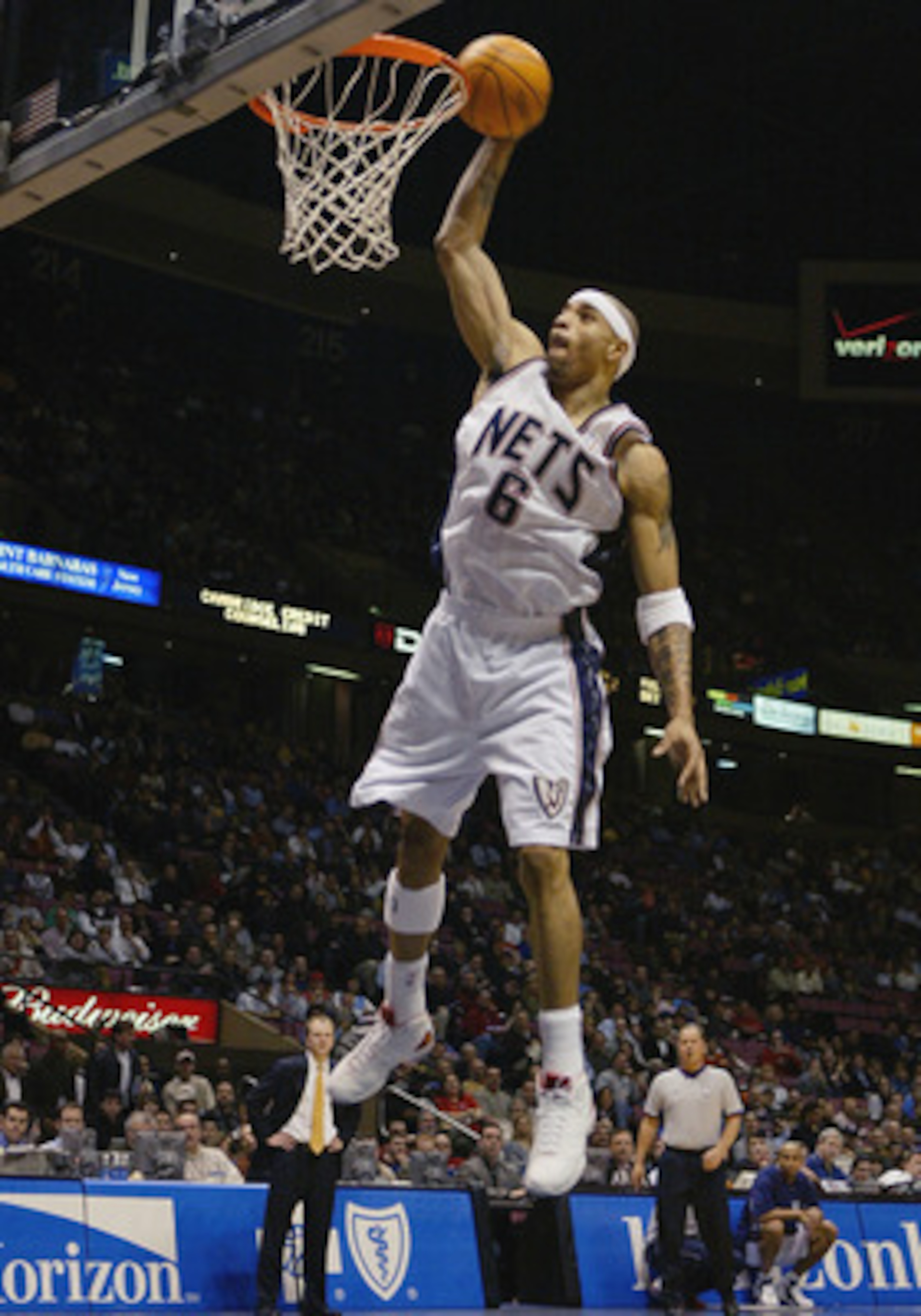 EAST RUTHERFORD, NJ - FEBRUARY 18:  Kenyon Martin #6 of the New Jersey Nets dunks the ball during the game against the Atlanta Hawks at Continental Airlines Arena on February 18, 2004 in East Rutherford, New Jersey.  The Nets won 98-92.  NOTE TO USER: Use