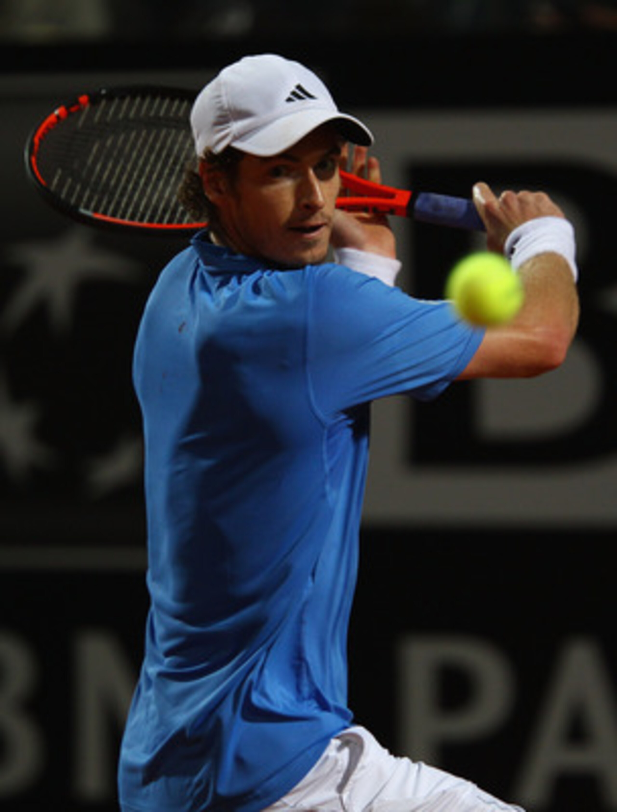 ROME, ITALY - MAY 14:  Andy Murray of Great Britain plays a backhand during his semi final match againstNovak Djokovic of Serbia during day seven of the Internazoinali BNL D'Italia at the Foro Italico Tennis Centre  on May 14, 2011 in Rome, Italy.  (Photo