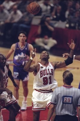 10 Jun 1998:  Dennis Rodman #91 of the Chicago Bulls in action against John Stockton of the Utah Jazz during the NBA Finals Game 4 at the United Center in Chicago, Illinois.  The Bulls defeated the Jazz 86-82. Mandatory Credit: Jonathan Daniel  /Allsport