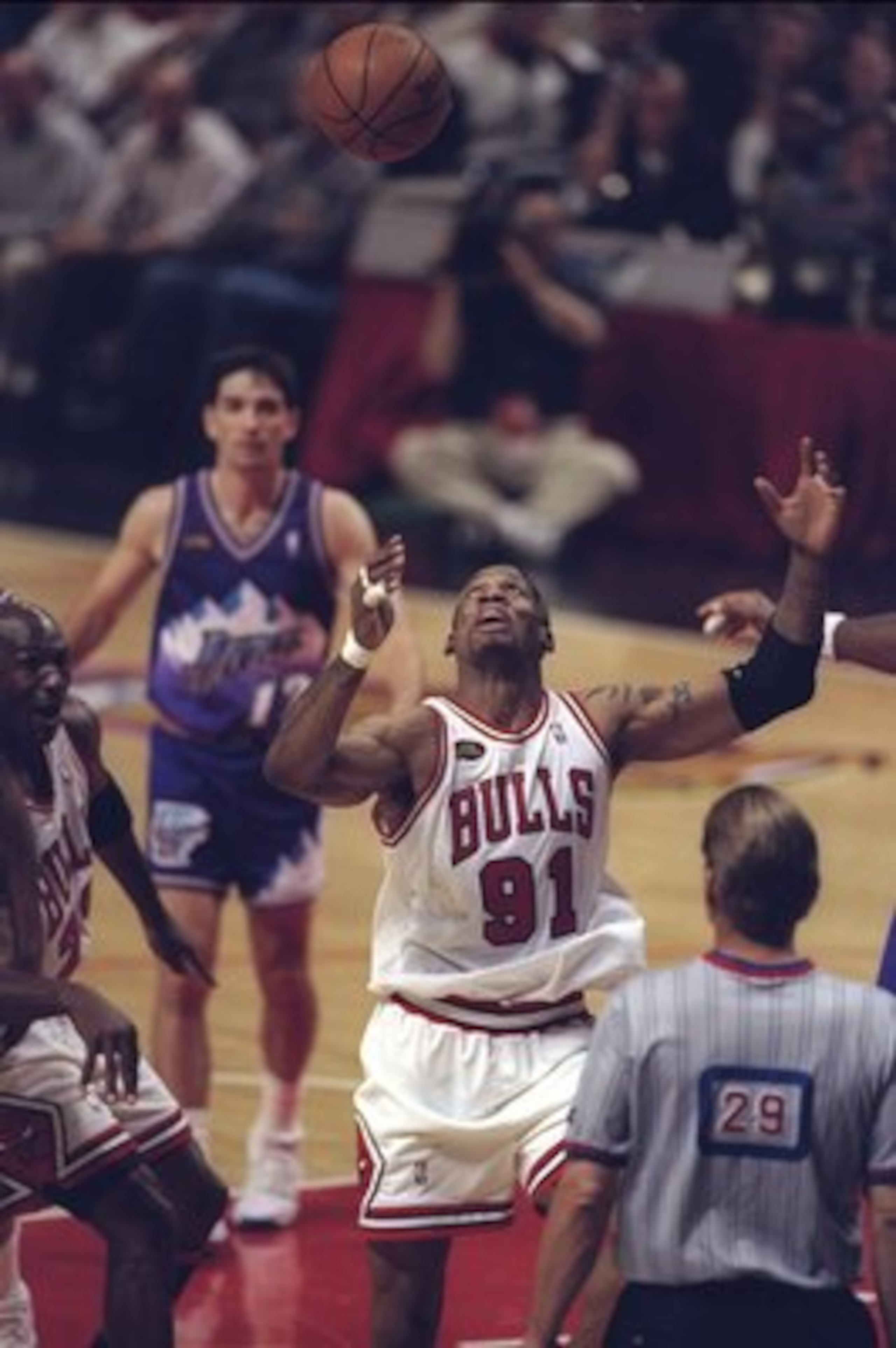10 Jun 1998:  Dennis Rodman #91 of the Chicago Bulls in action against John Stockton of the Utah Jazz during the NBA Finals Game 4 at the United Center in Chicago, Illinois.  The Bulls defeated the Jazz 86-82. Mandatory Credit: Jonathan Daniel  /Allsport