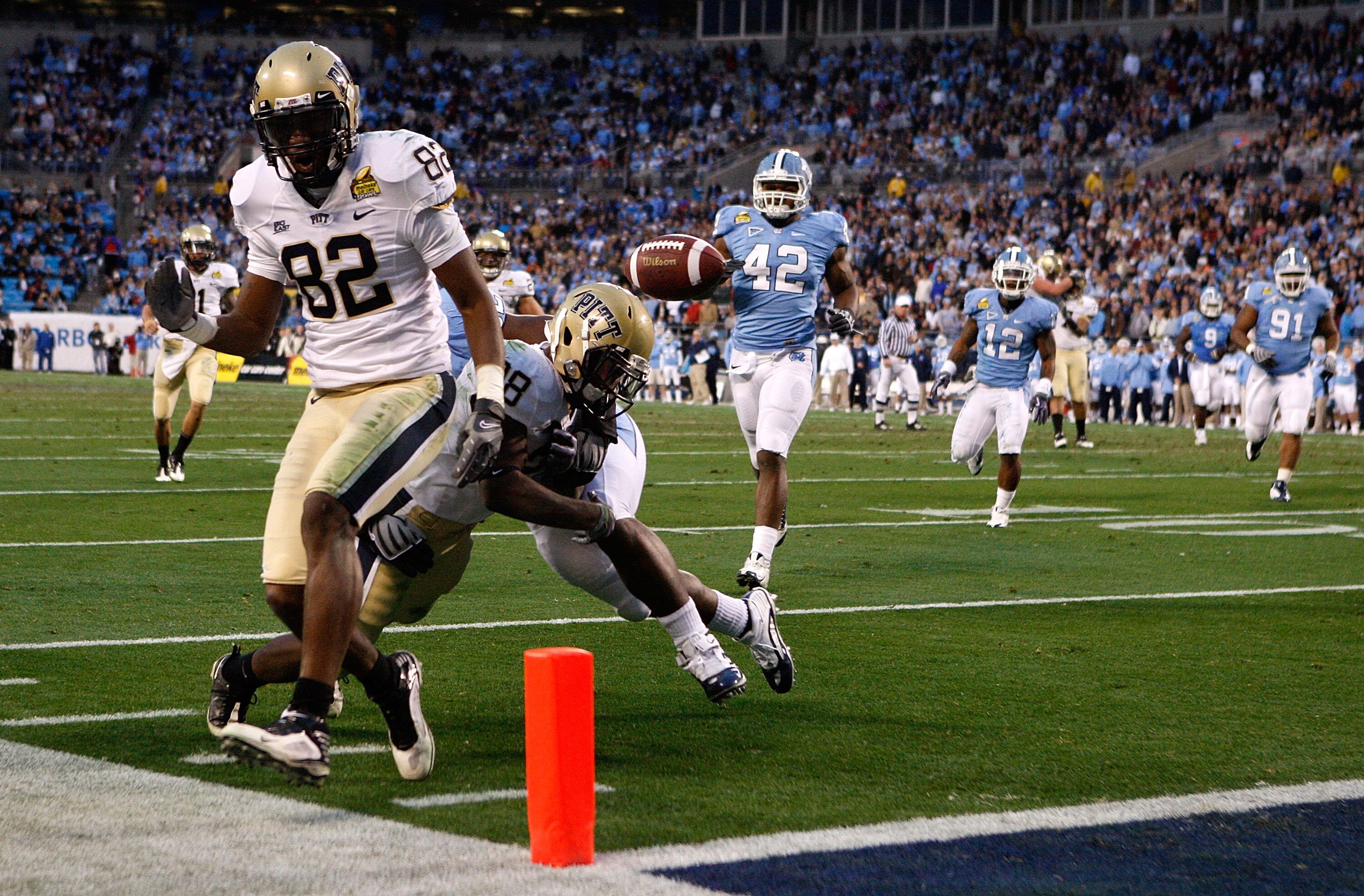 CHARLOTTE, NC - DECEMBER 26: Jonathan Baldwin #82 of the Pittsburgh Panthers watches as teammate Dion Lewis #28 fumbles the ball at the goal line against the North Carolina Tar Heels during their game on December 26, 2009 in Charlotte, North Carolina. ( CHARLOTTE, NC - DECEMBER 26: Jonathan Baldwin #82 of the Pittsburgh Panthers watches as teammate Dion Lewis #28 fumbles the ball at the goal line against the North Carolina Tar Heels during their game on December 26, 2009 in Charlotte, North Carolina. (