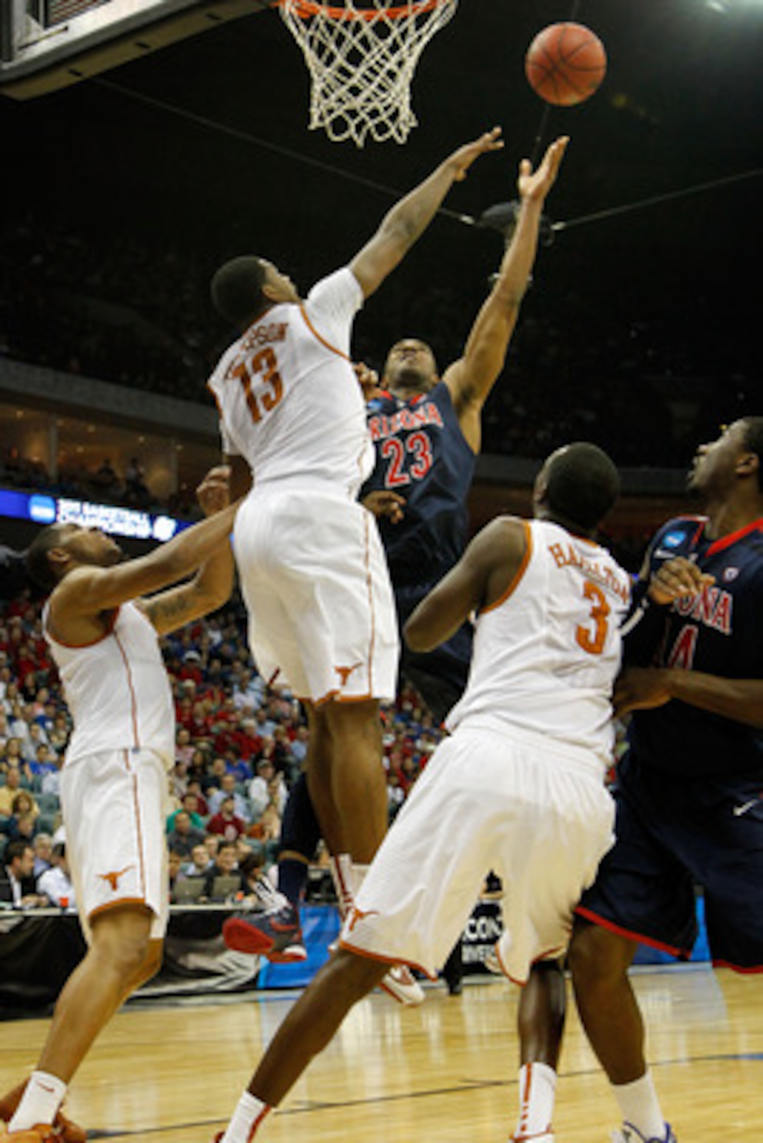 TULSA, OK - MARCH 20:  Derrick Williams #23 of the Arizona Wildcats goes up for a shot against Tristan Thompson #13 of the Texas Longhorns during the third round of the 2011 NCAA men's basketball tournament at BOK Center on March 20, 2011 in Tulsa, Oklaho