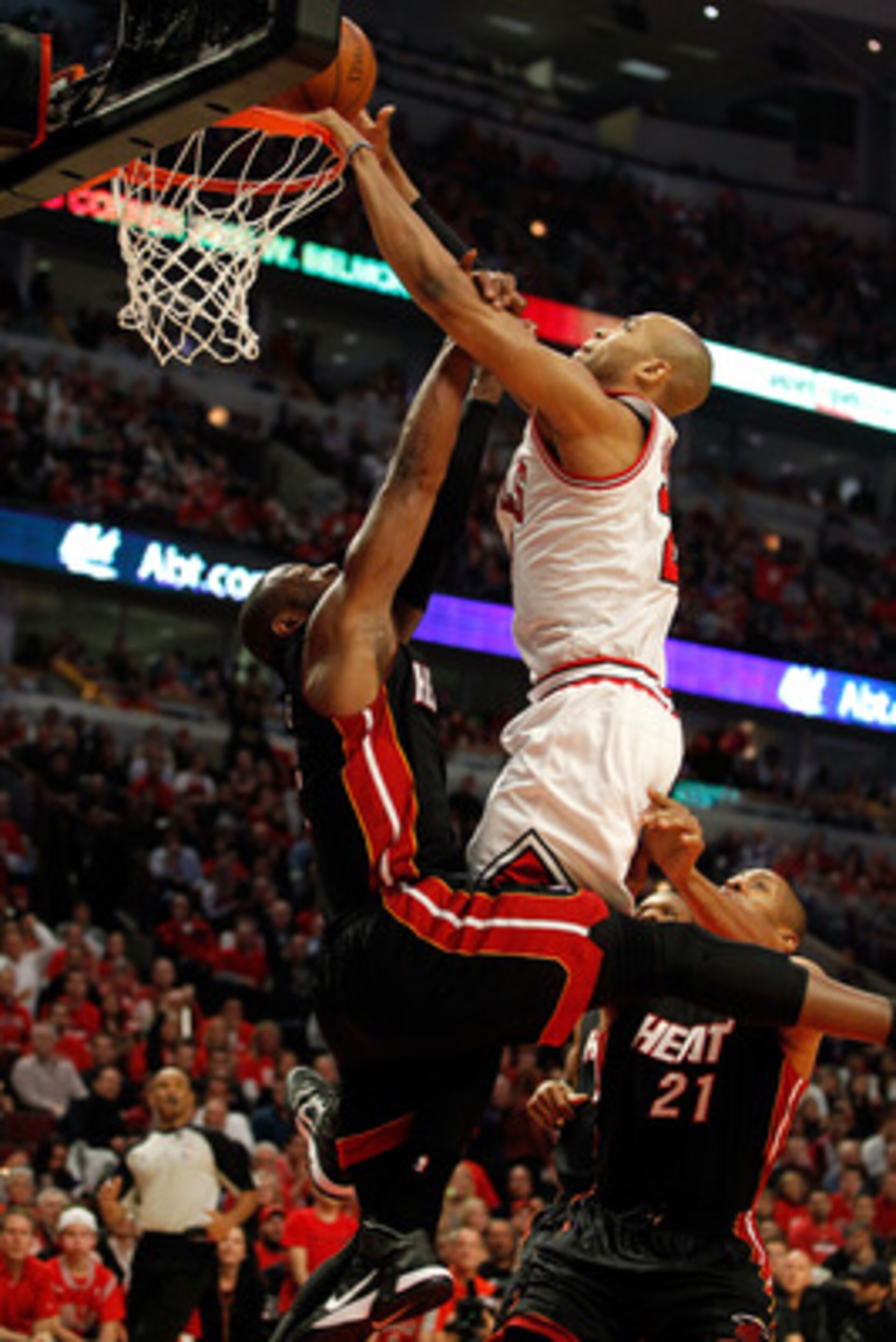 CHICAGO, IL - MAY 15: Taj Gibson #22 of the Chicago Bulls dunks against Dwyane Wade #3 of the Miami Heat in Game One of the Eastern Conference Finals during the 2011 NBA Playoffs on May 15, 2011 at the United Center in Chicago, Illinois. NOTE TO USER: Us CHICAGO, IL - MAY 15: Taj Gibson #22 of the Chicago Bulls dunks against Dwyane Wade #3 of the Miami Heat in Game One of the Eastern Conference Finals during the 2011 NBA Playoffs on May 15, 2011 at the United Center in Chicago, Illinois. NOTE TO USER: Us