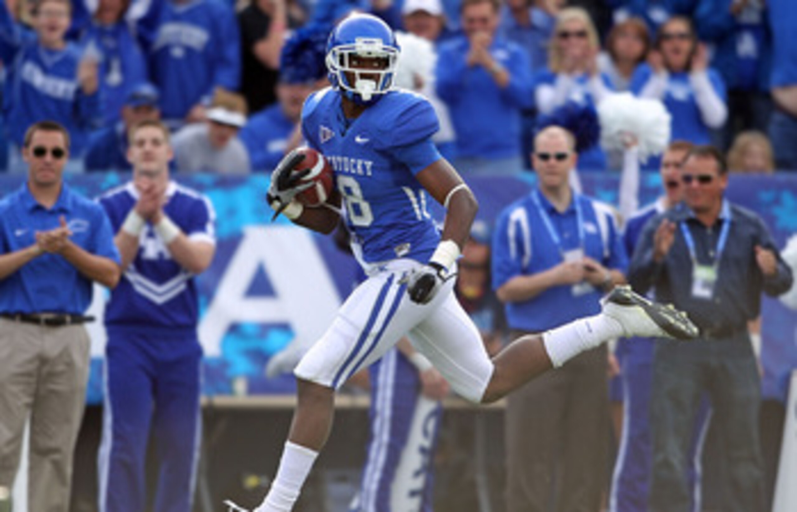 LEXINGTON, KY - NOVEMBER 13: Chris Matthews #8 of the Kentucky Wildcats runs for a touchdown after a reception during the game against the Vanderbilt Commodores at Commonwealth Stadium on November 13, 2010 in Lexington, Kentucky.  (Photo by Andy Lyons/Get
