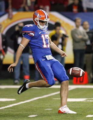 ATLANTA - DECEMBER 06:  Chas Henry #17 of the Florida Gators punts the ball against the Alabama Crimson Tide during the SEC Championship on December 6, 2008 at the Georgia Dome in Atlanta, Georgia.  (Photo by Kevin C. Cox/Getty Images)